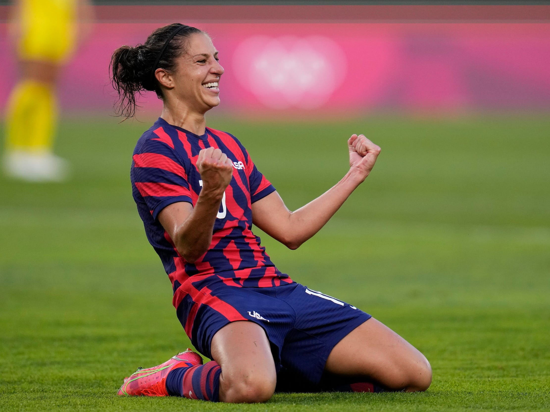 United States' Carli Lloyd celebrates scoring her side's 4th goal against Australia in the women's bronze medal soccer match at the 2020 Summer Olympics, Thursday, Aug. 5, 2021, in Kashima, Japan.