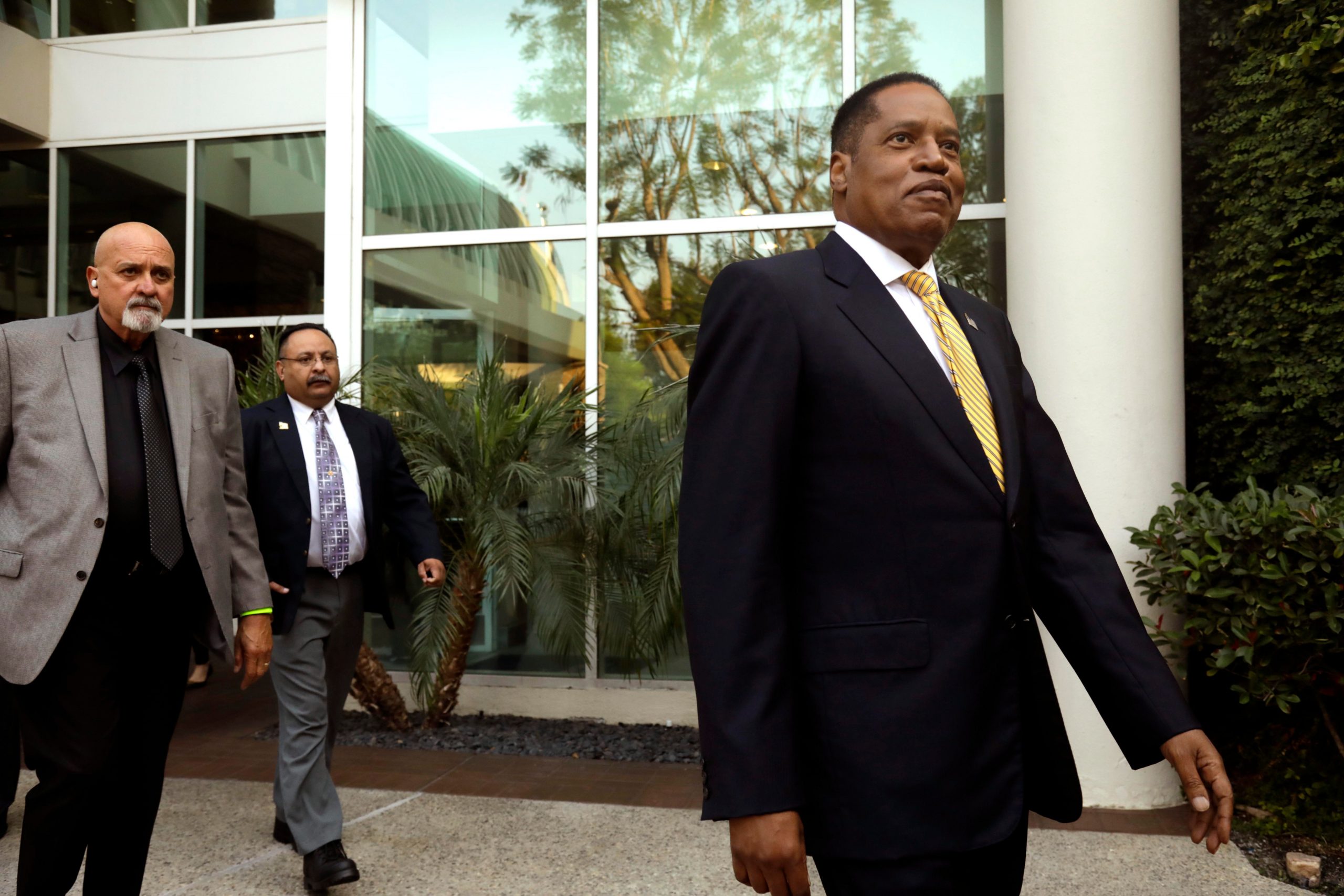 Conservative radio talk show host Larry Elder, who is running for governor of California, greets supporters at the Warner Center Marriott in Woodland Hills on August 10, 2021.