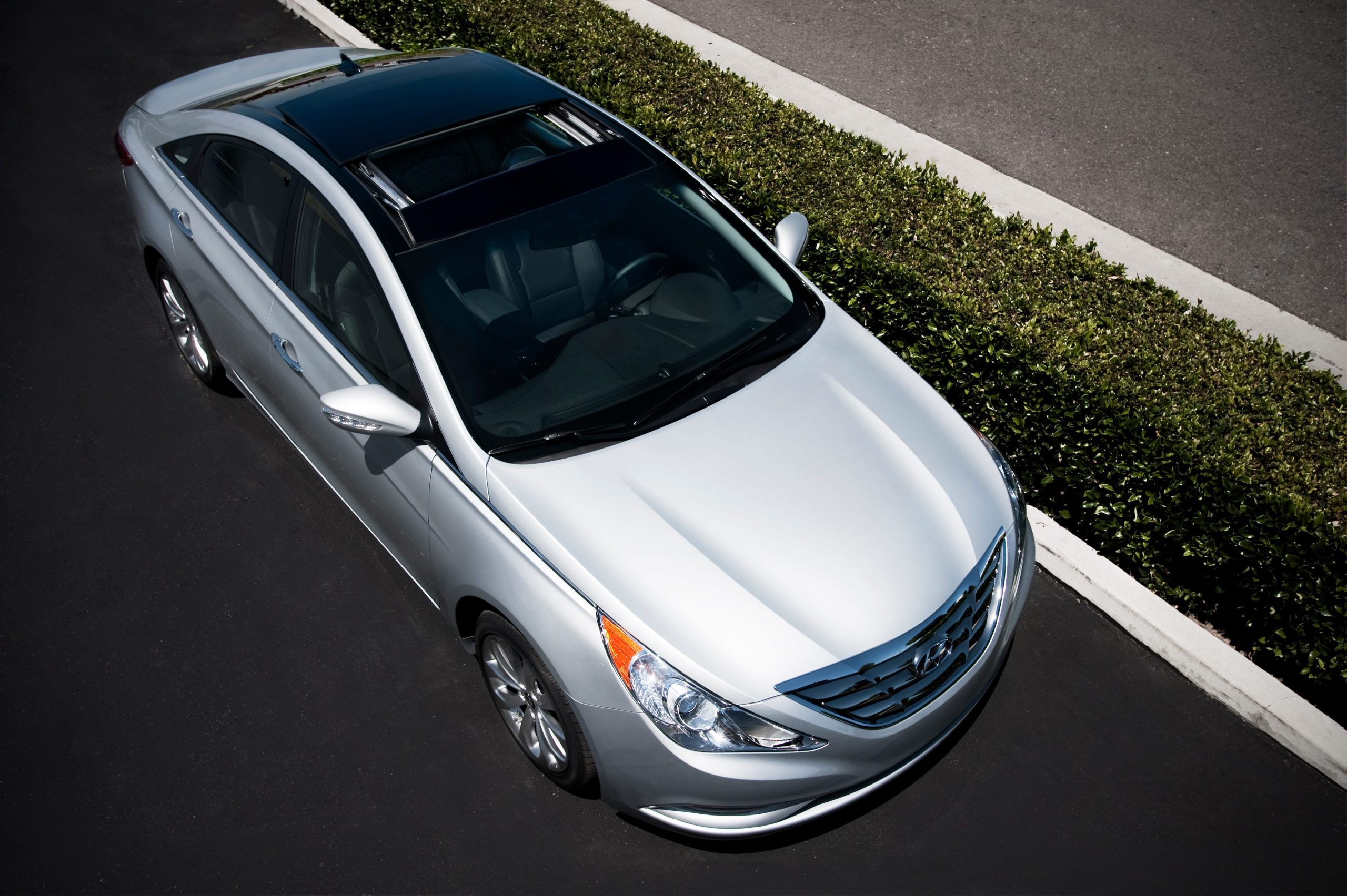 A silver 2012 Hyundai Sonata.