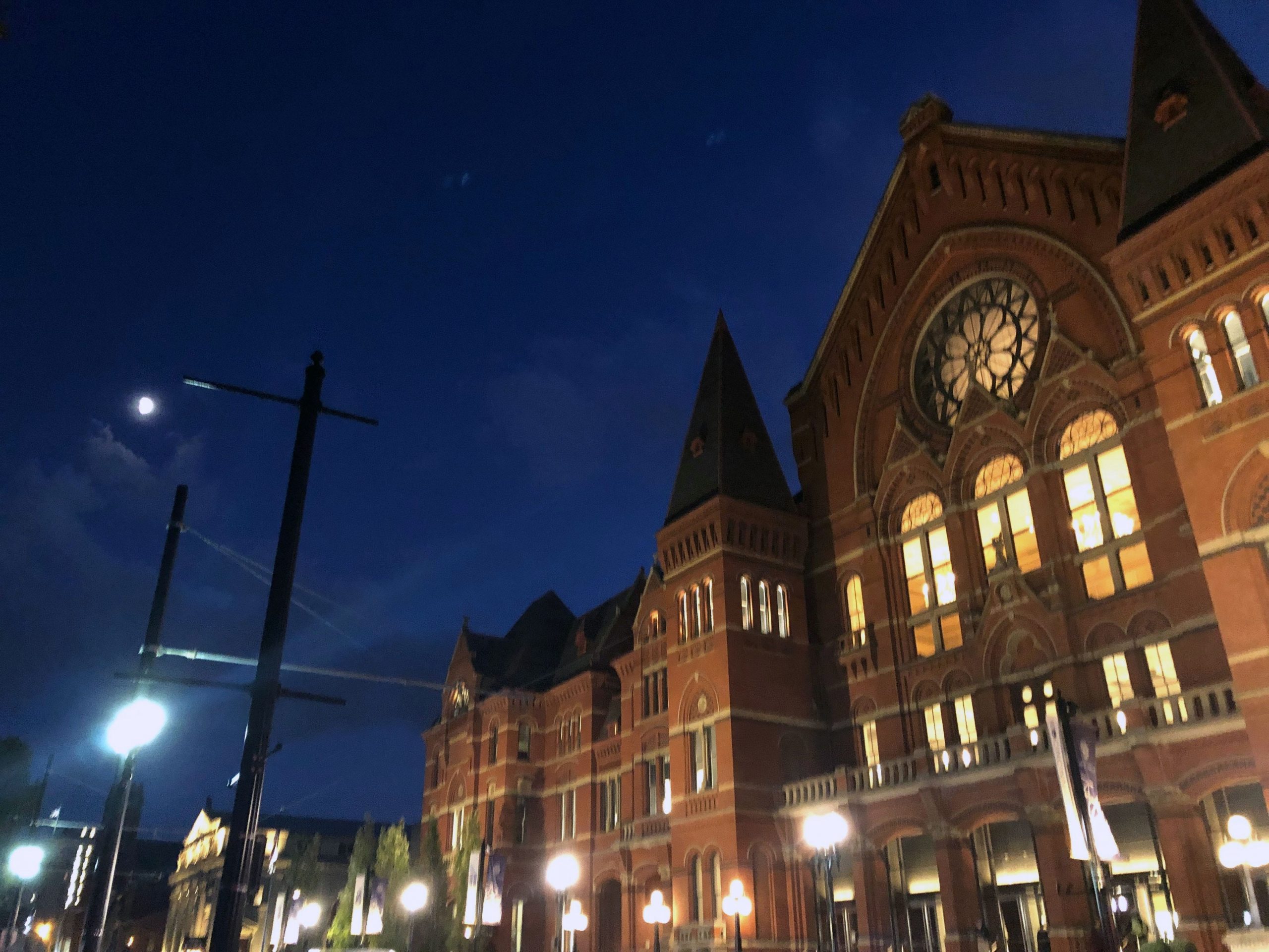 Street view of Music Hall, which is brown and elaborate