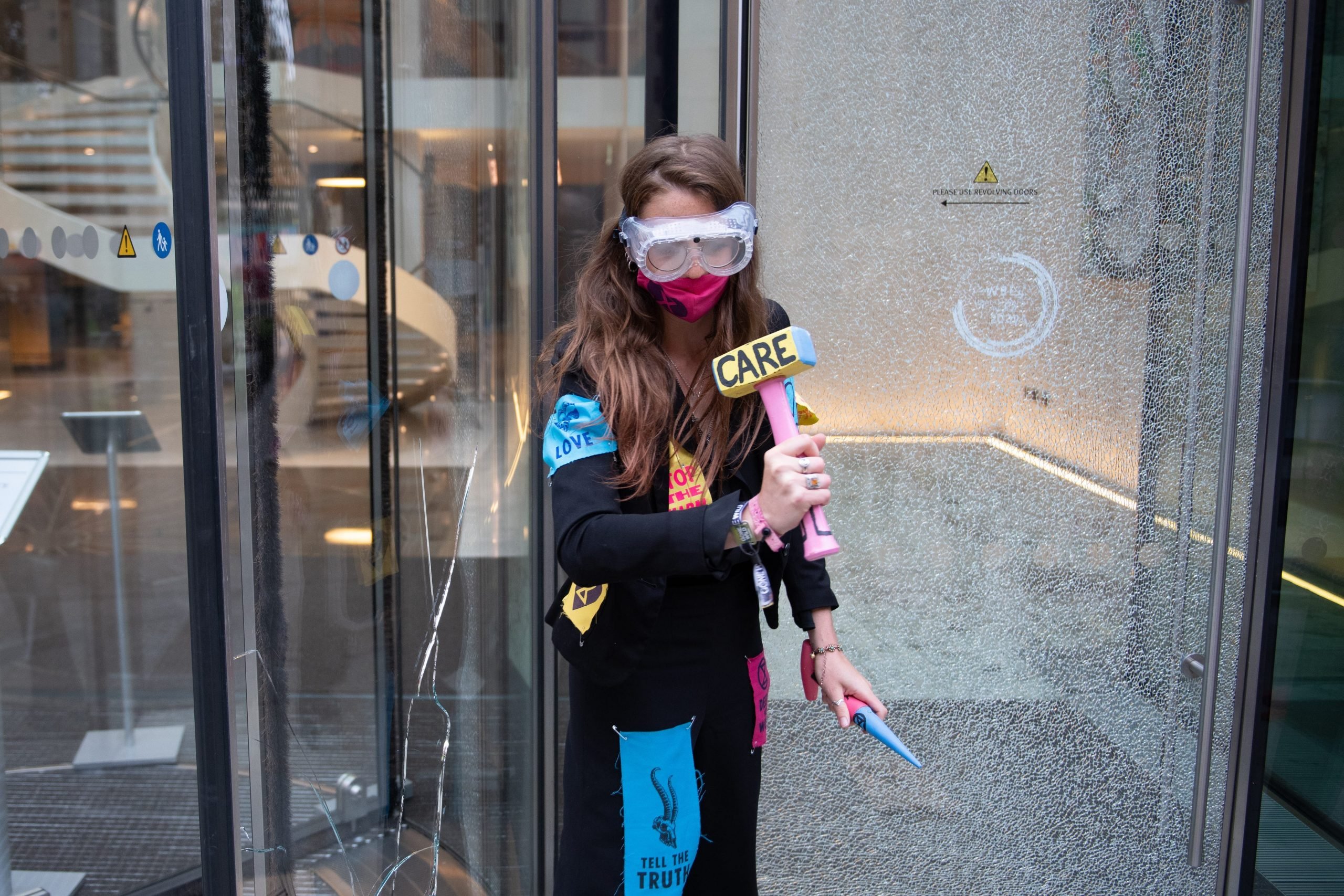 Extinction Rebellion activists break windows of the JPMorgan offices in central London, on September 1.