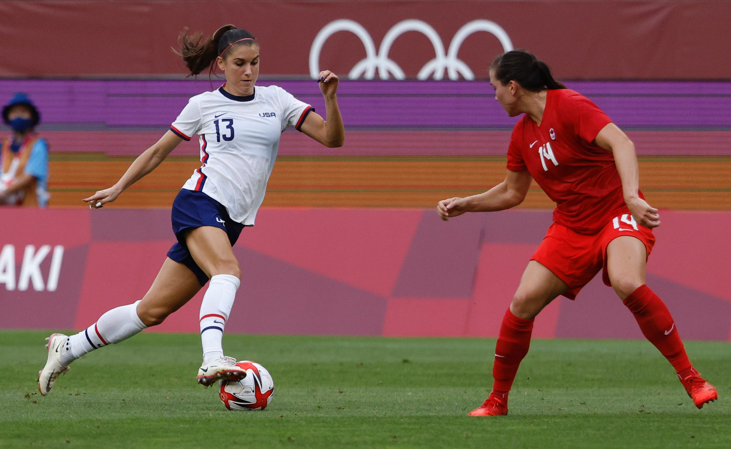 Alex Morgan dribbles during the semifinal match of the Tokyo Olympics.