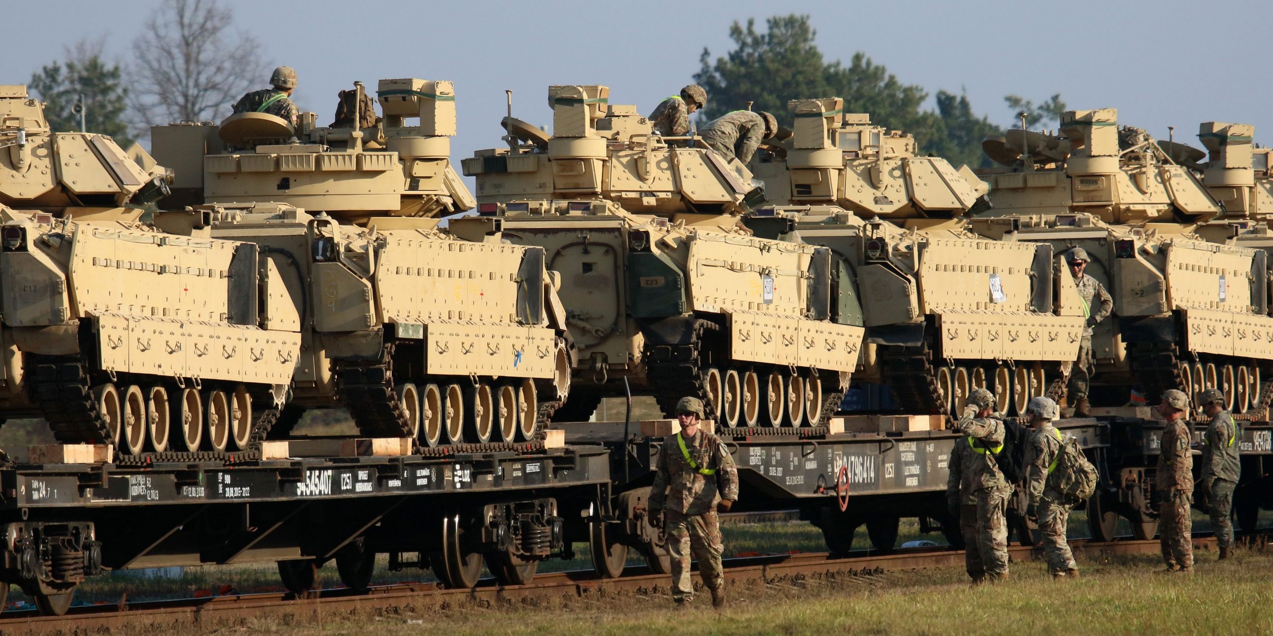 Multiple tanks on a rail car.