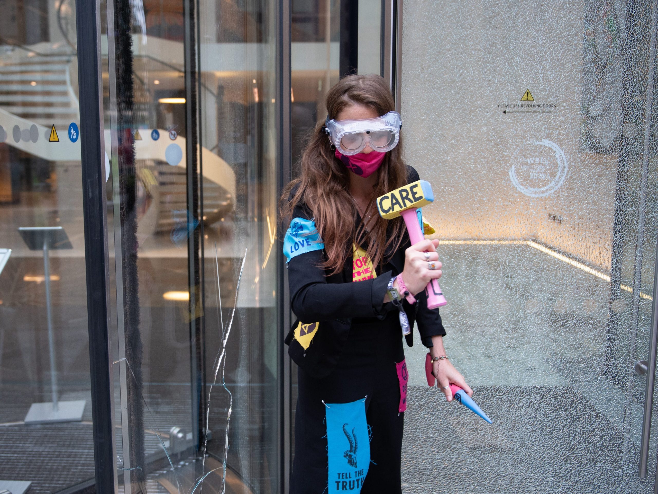 Extinction Rebellion activists break windows of the JPMorgan offices in central London, on September 1.