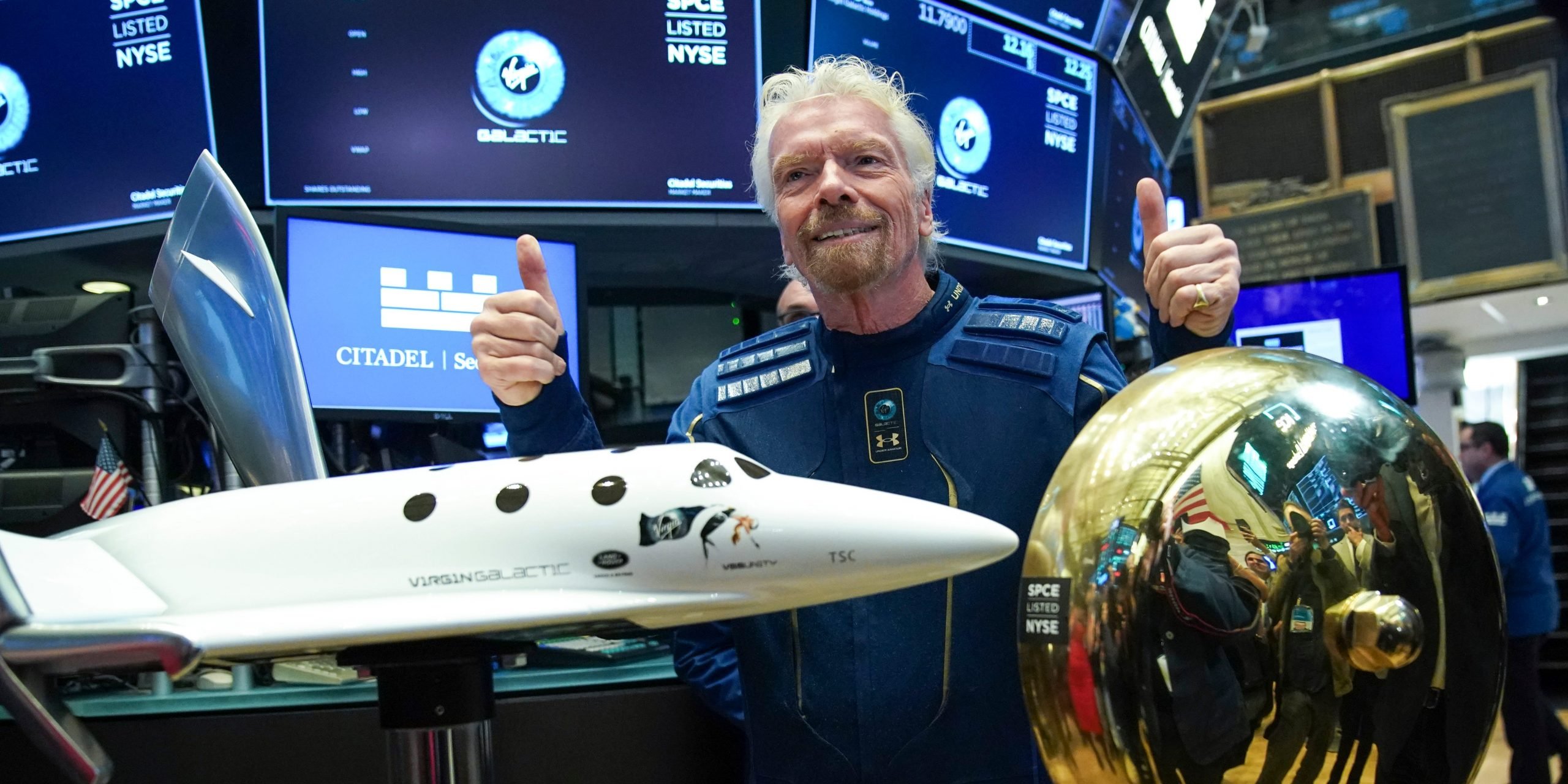 Sir Richard Branson, Founder of Virgin Galactic, poses for photographs before ringing a ceremonial bell on the floor of the New York Stock Exchange (NYSE) to promote the first day of trading of Virgin Galactic Holdings shares on October 28, 2019 in New York City.