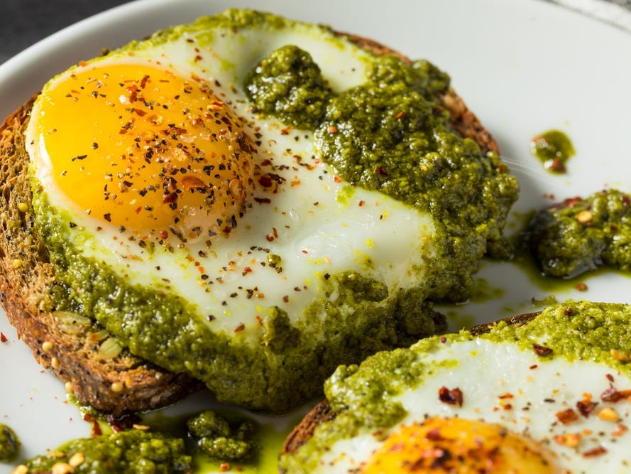 Shot of pesto eggs on toast.