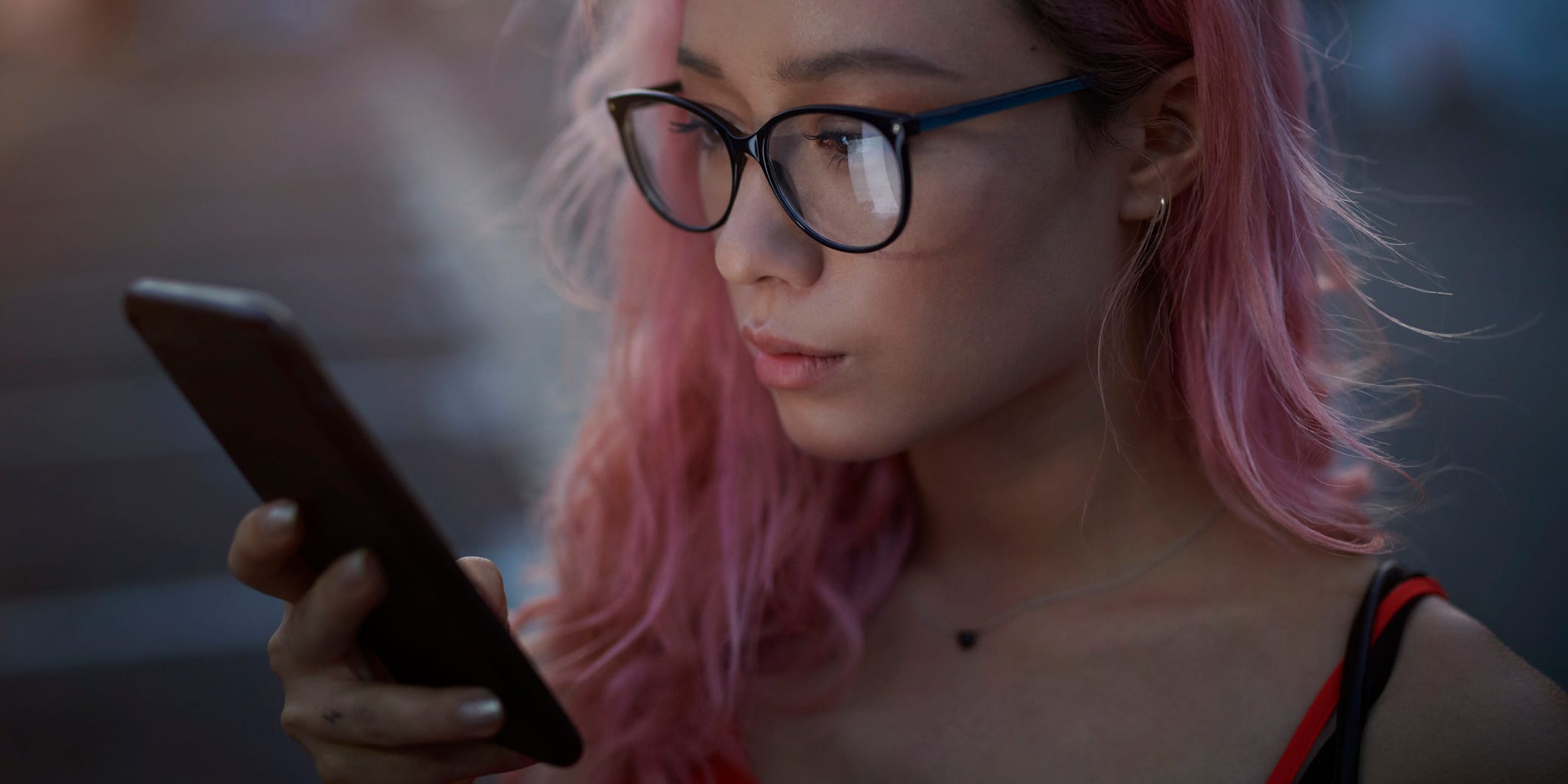 young woman using cell phone
