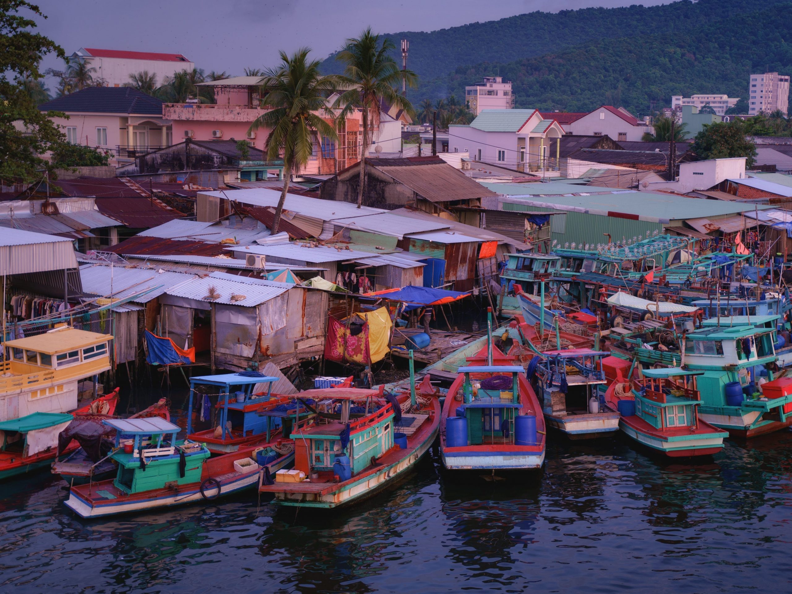 colorful fishing boats in vietnam