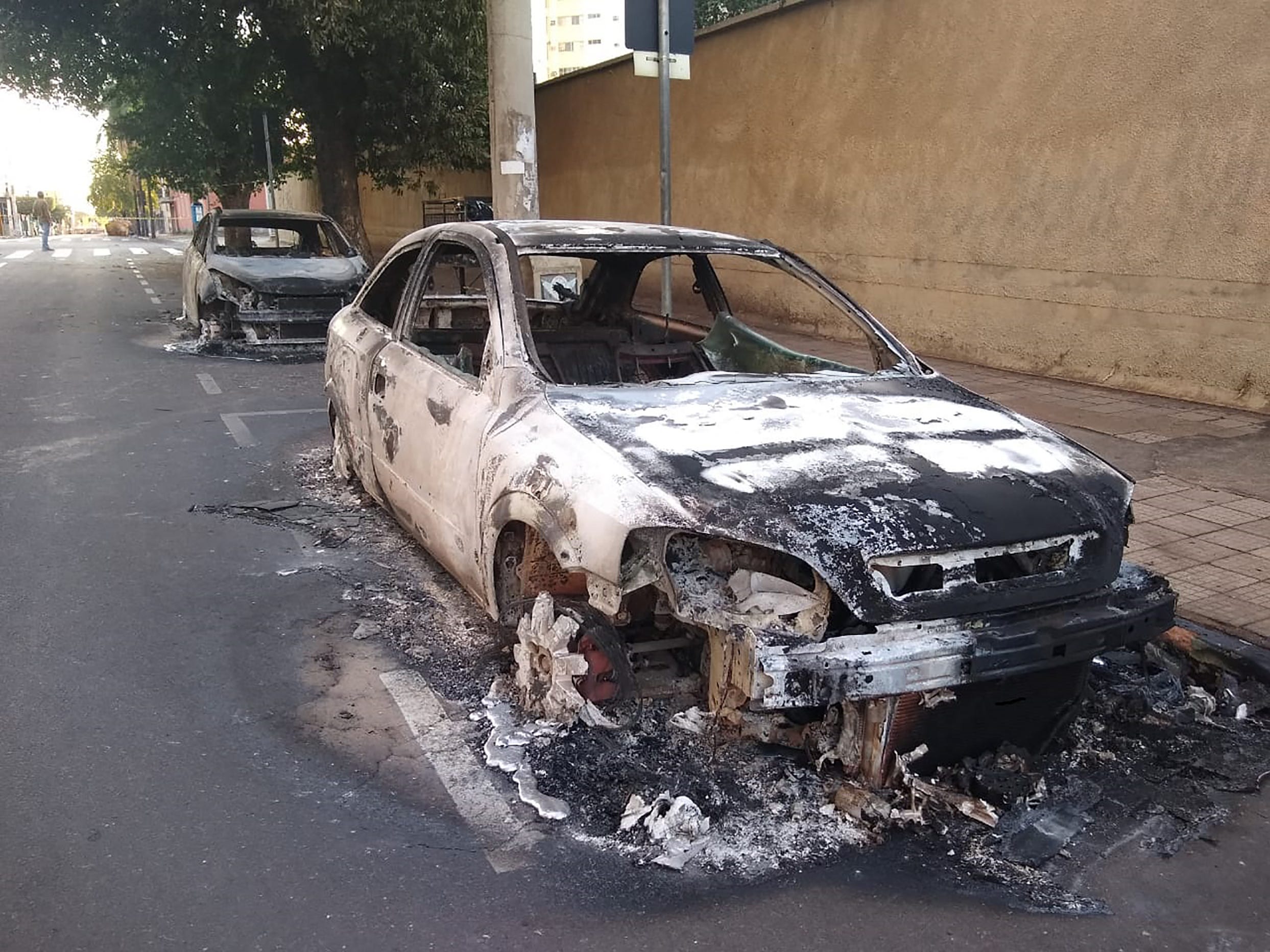 A car burnt during a deadly bank robbery in Brazil