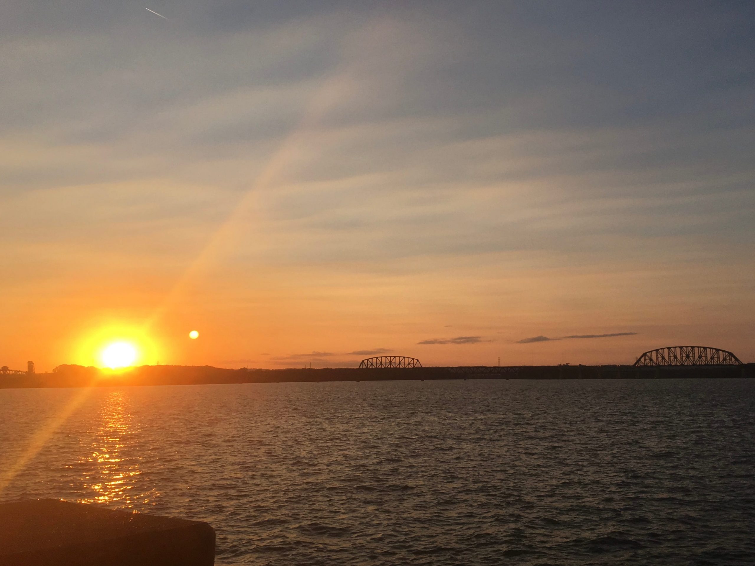 sunsetting over the ohio river in louisville kentucky