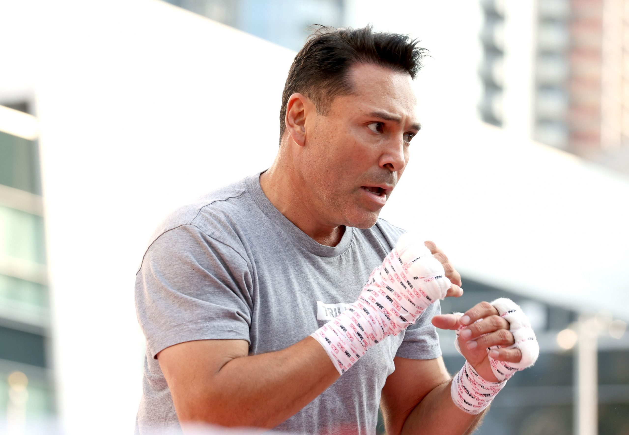 Oscar De La Hoya strikes a boxing pose outdoors