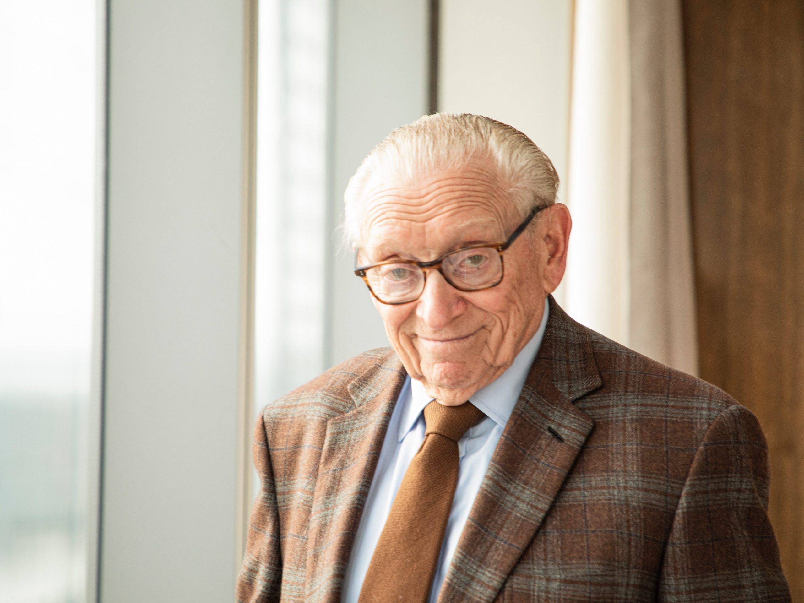 A headshot of Larry Silverstein recently in his 38th floor office at 7 World Trade Center