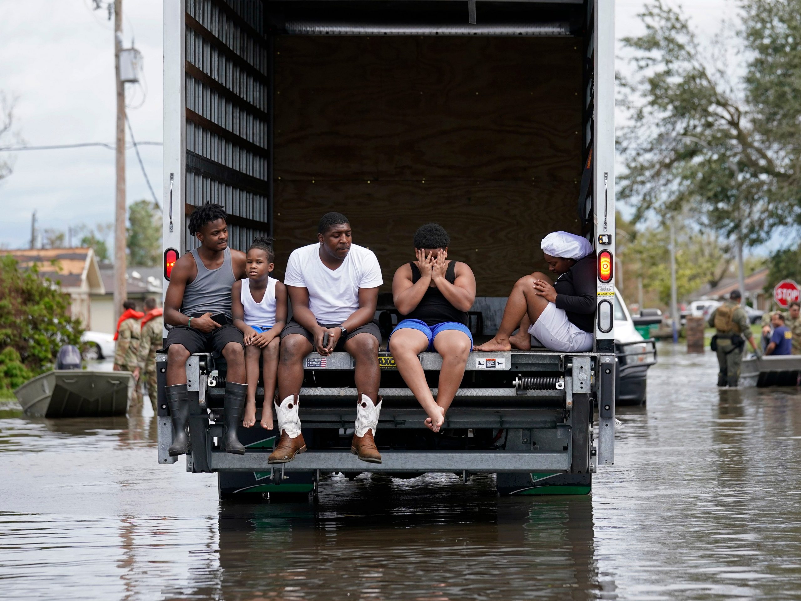 People are evacuated from floodwaters in the aftermath of Hurricane Ida in LaPlace, La., Monday, Aug. 30, 2021