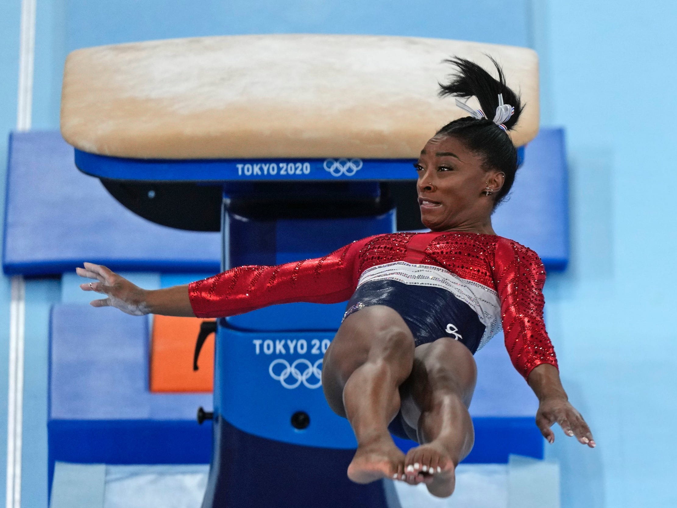 Simone Biles vaults at the Tokyo Olympics.