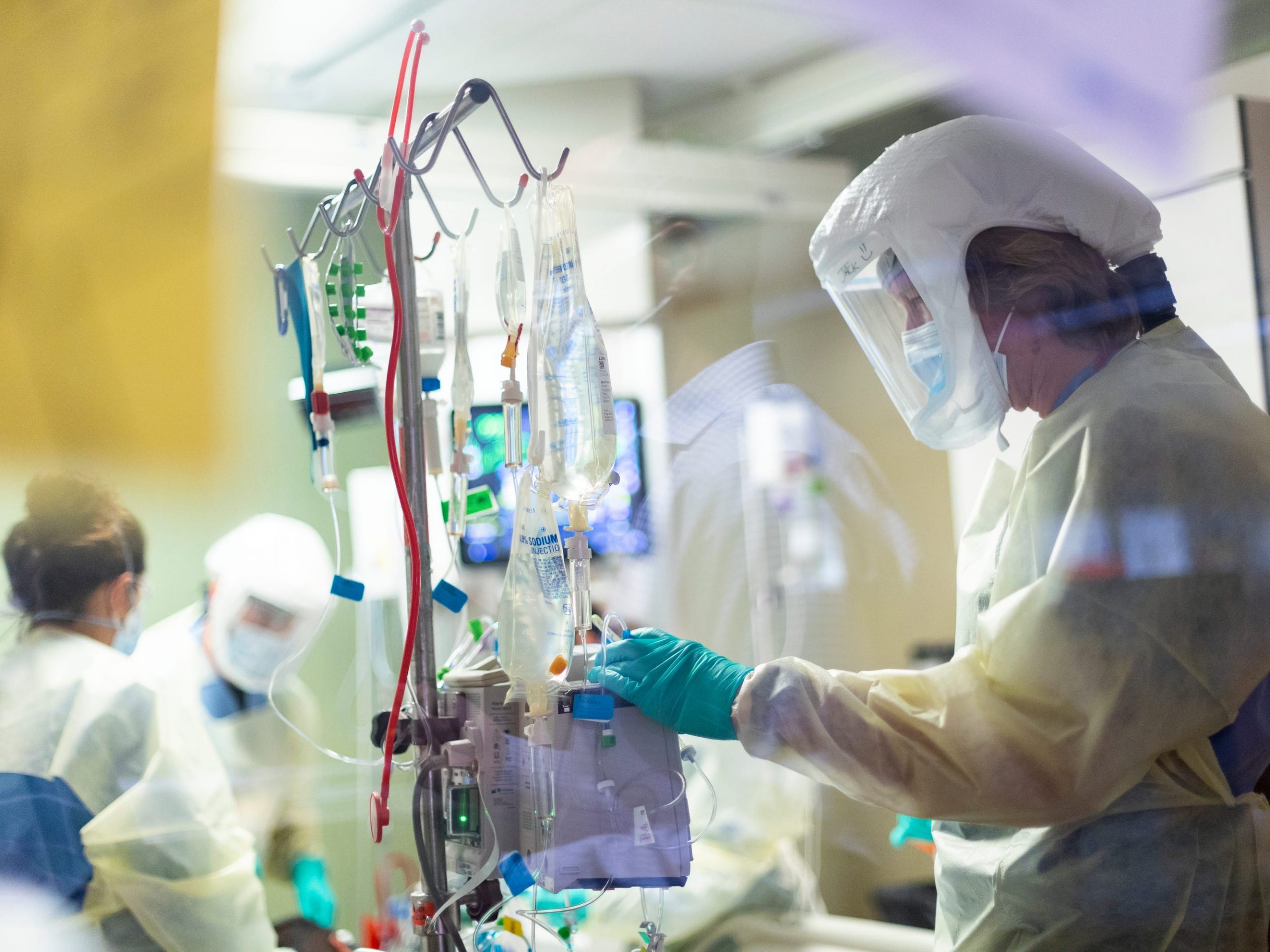 In this Aug. 31, 2021, file photo, Jack Kingsley R.N. attends to a COVID-19 patient in the Medical Intensive care unit (MICU) at St. Luke's Boise Medical Center in Boise, Idaho. Idaho public health leaders have activated "crisis standards of care" for the state's northern hospitals because there are more coronavirus patients than the institutions can handle. The Idaho Department of Health and Welfare made the announcement Tuesday, Sept. 7.