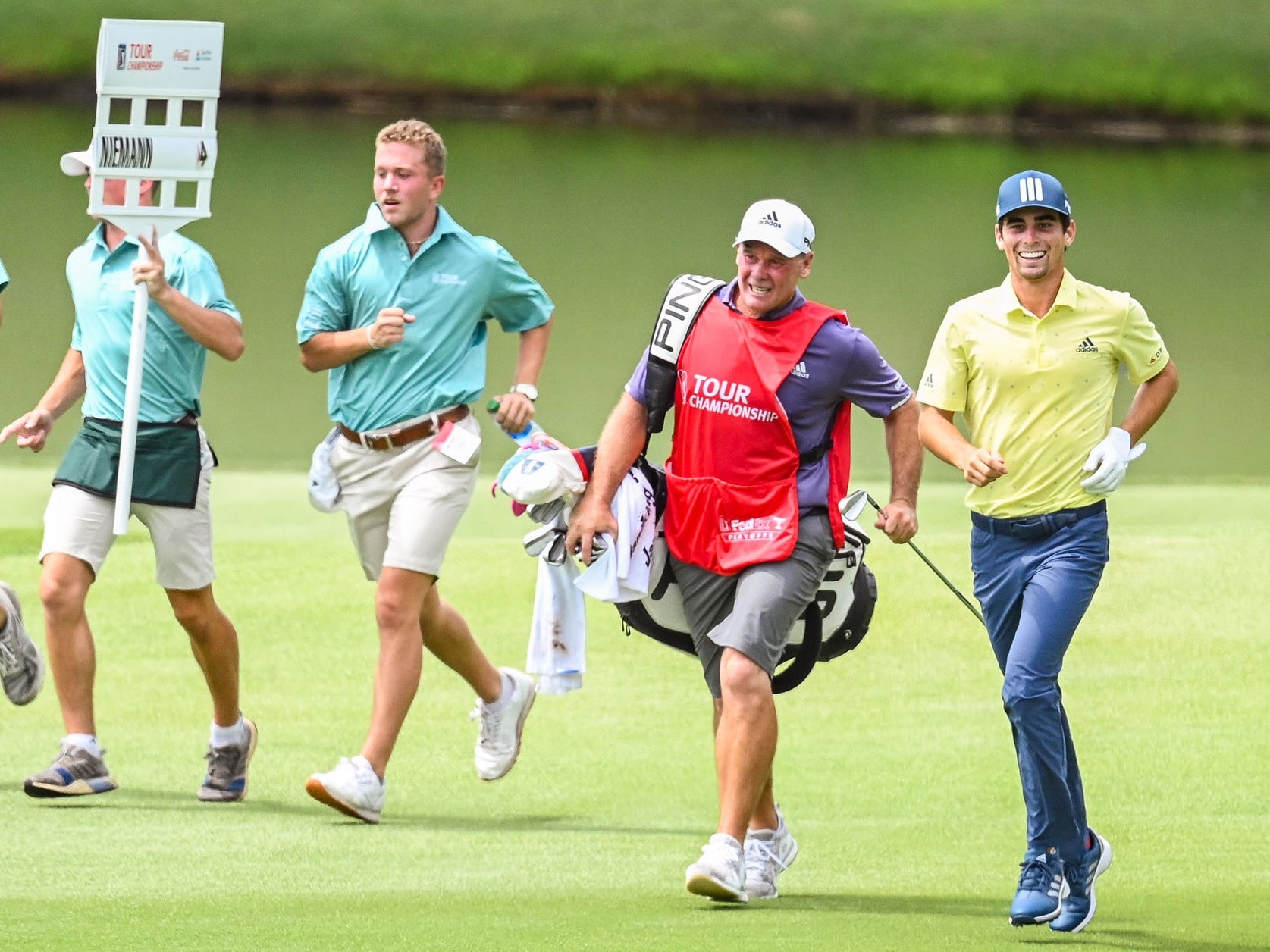 Juaquin Niemann runs to his next shot at the Tour Championship.