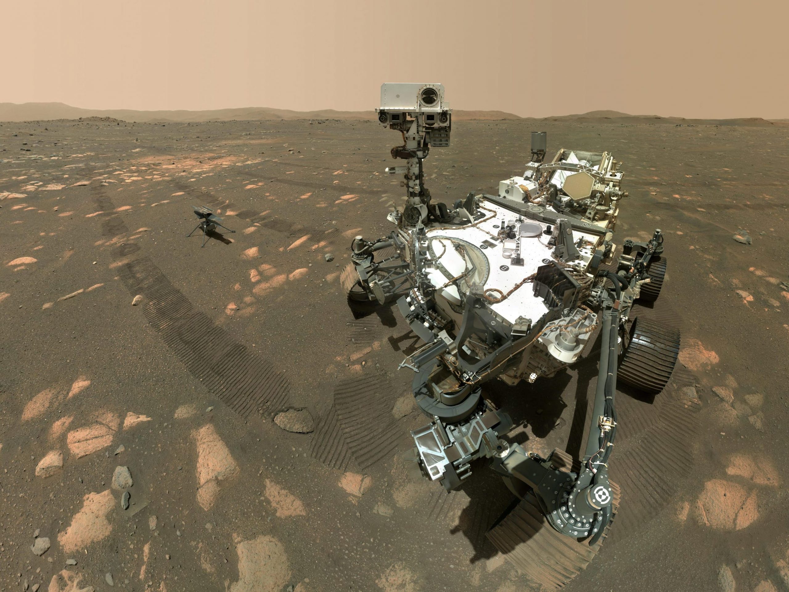 perseverance rover on mars takes selfie with ingenuity helicopter