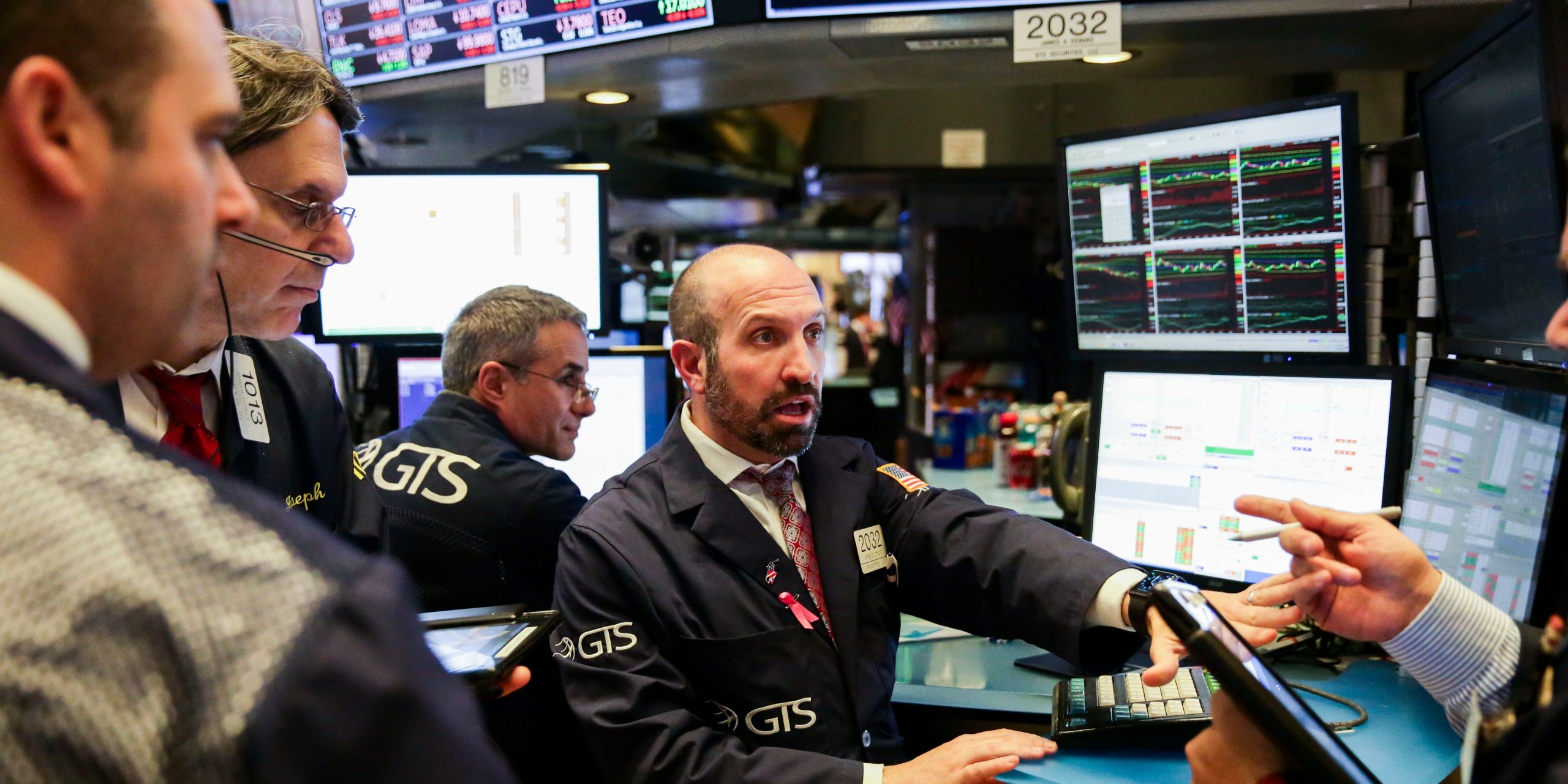 Traders work at the New York Stock Exchange in New York, the United States, Nov. 20, 2018.