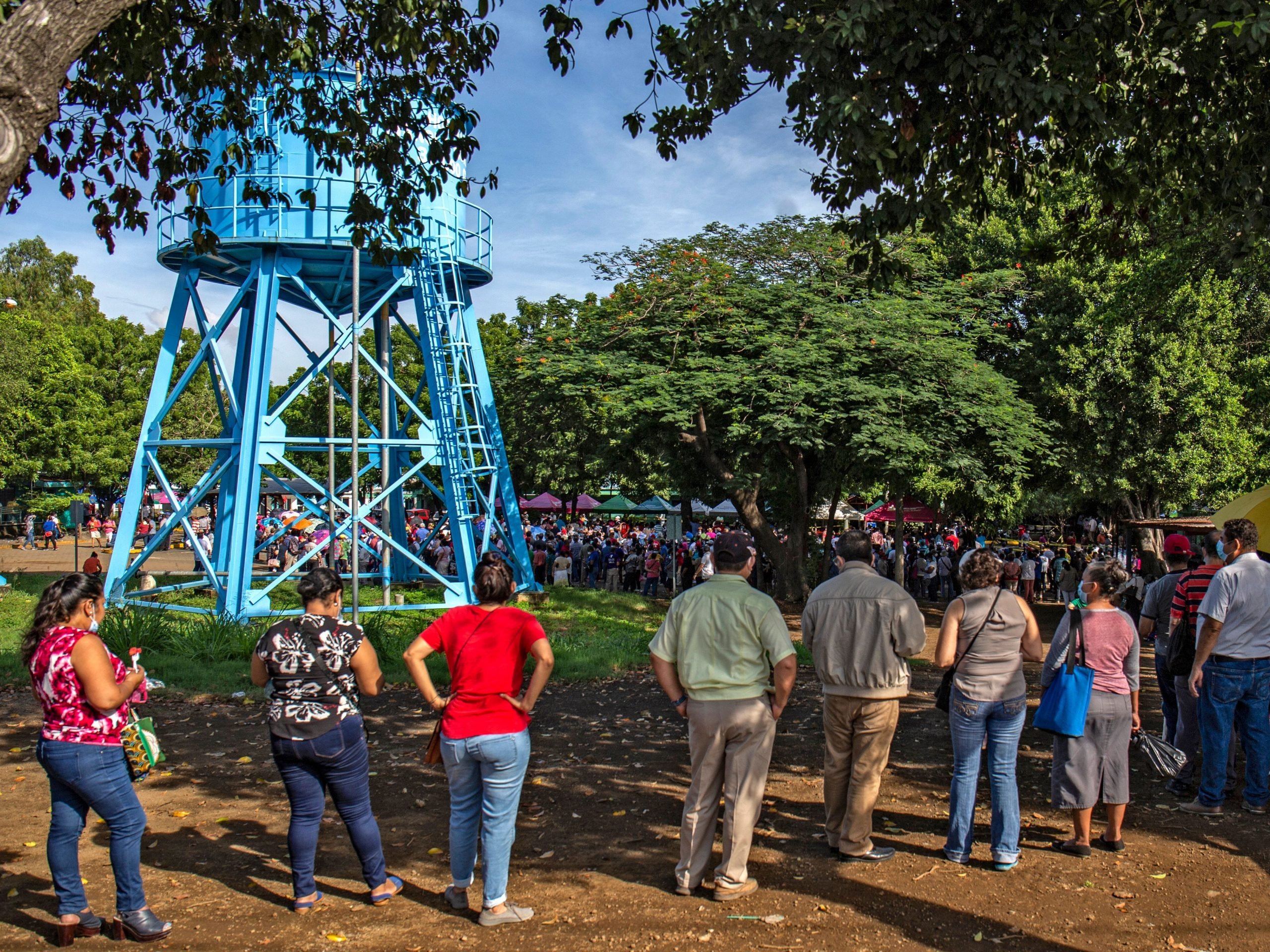 People wait in long lines and for hours to be vaccinated against COVID-19 with the Sputnik V vaccine at the Manolo Morales Hospital in Managua, on September 4, 2021.