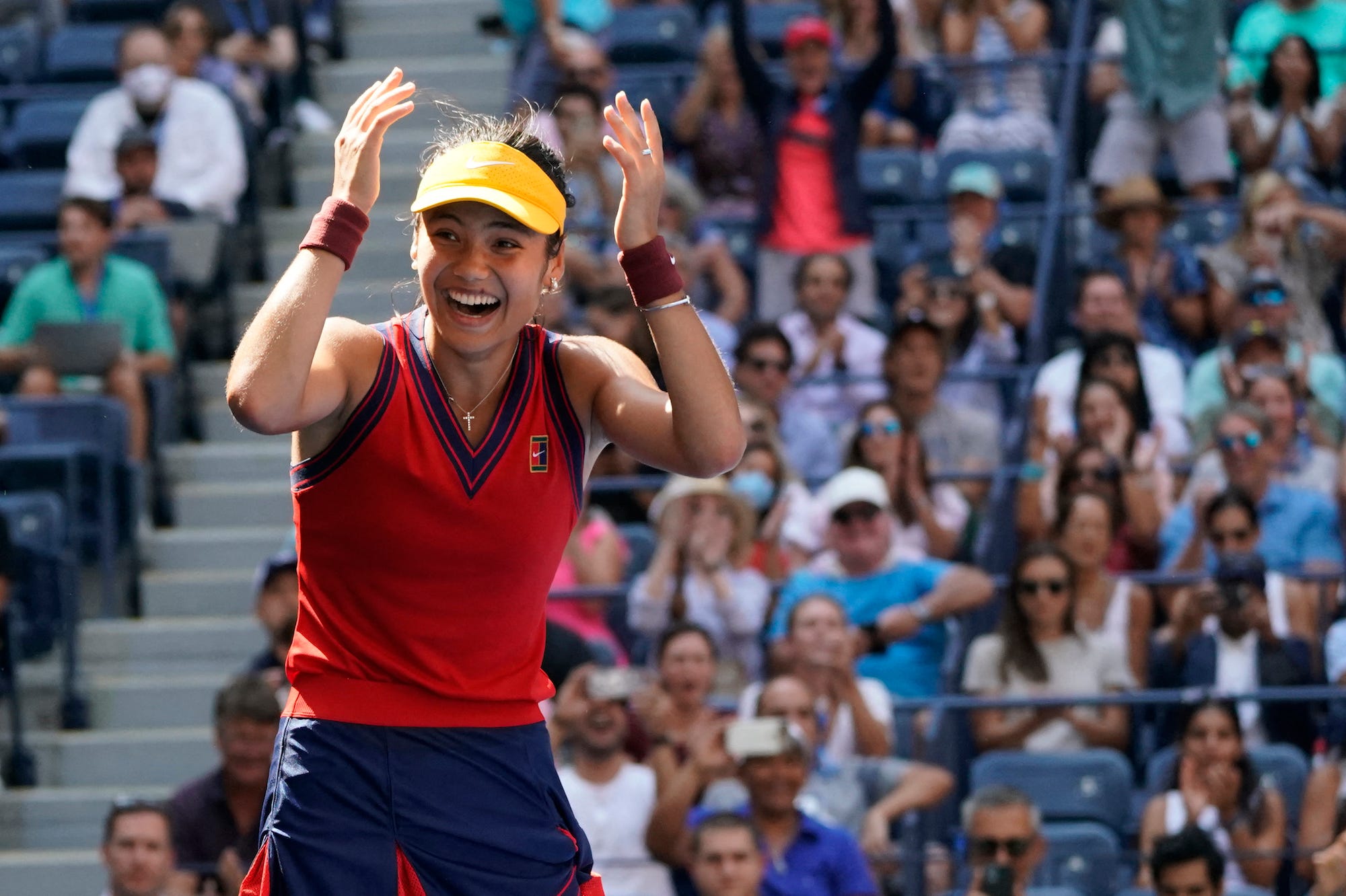 Britain's Emma Raducanu celebrates her win over Switzerland's Belinda Bencic during their 2021 US Open Tennis tournament women's quarter-finals match at the USTA Billie Jean King National Tennis Center in New York