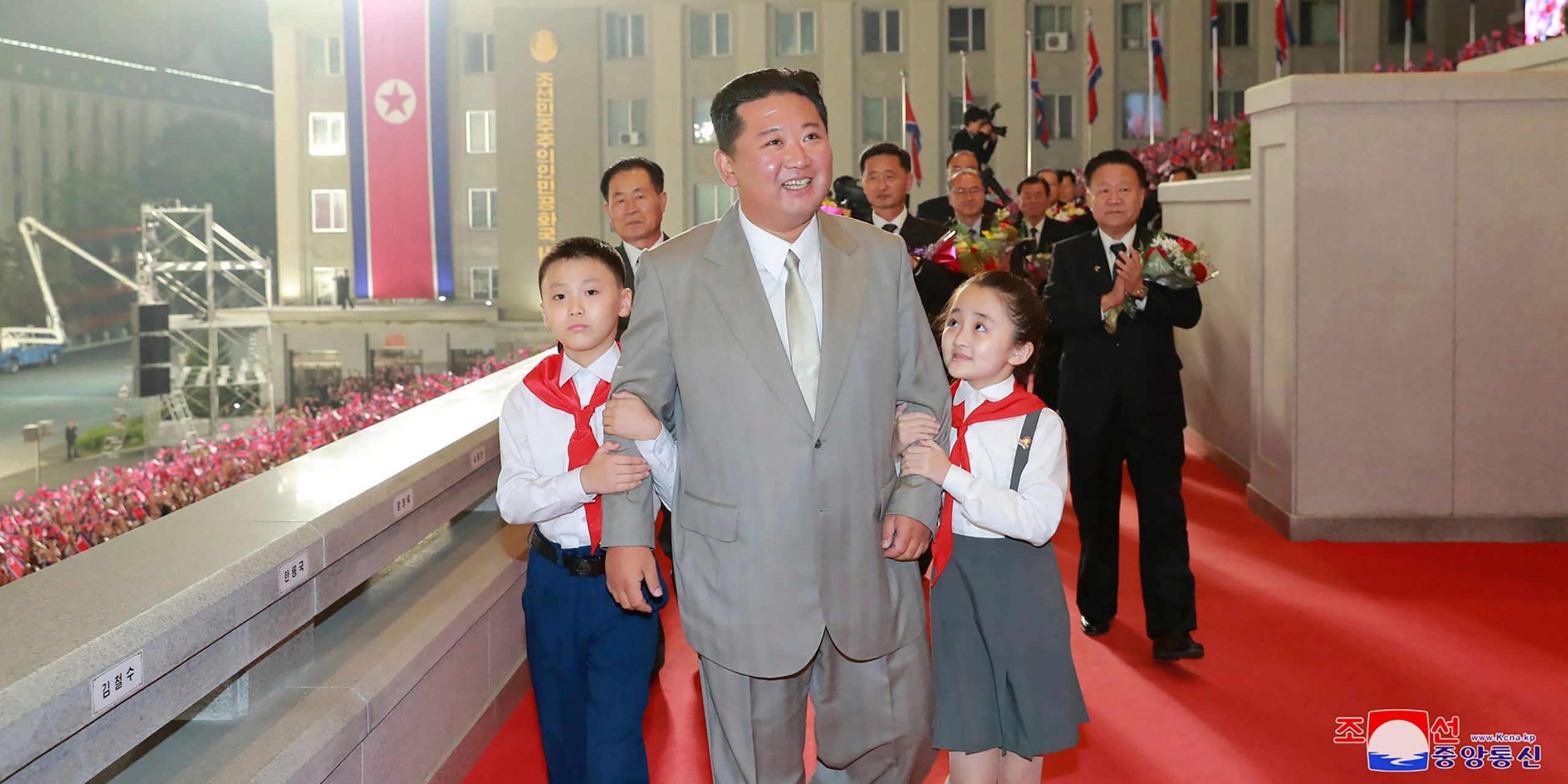 In this photo provided by the North Korean government, North Korean leader Kim Jong Un walks with children during a celebration of the nation’s 73rd anniversary at Kim Il Sung Square in Pyongyang, North Korea, early Thursday, Sept. 9, 2021. Independent journalists were not given access to cover the event depicted in this image distributed by the North Korean government. The content of this image is as provided and cannot be independently verified. Korean language watermark on image as provided by source reads: "KCNA" which is the abbreviation for Korean Central News Agency.