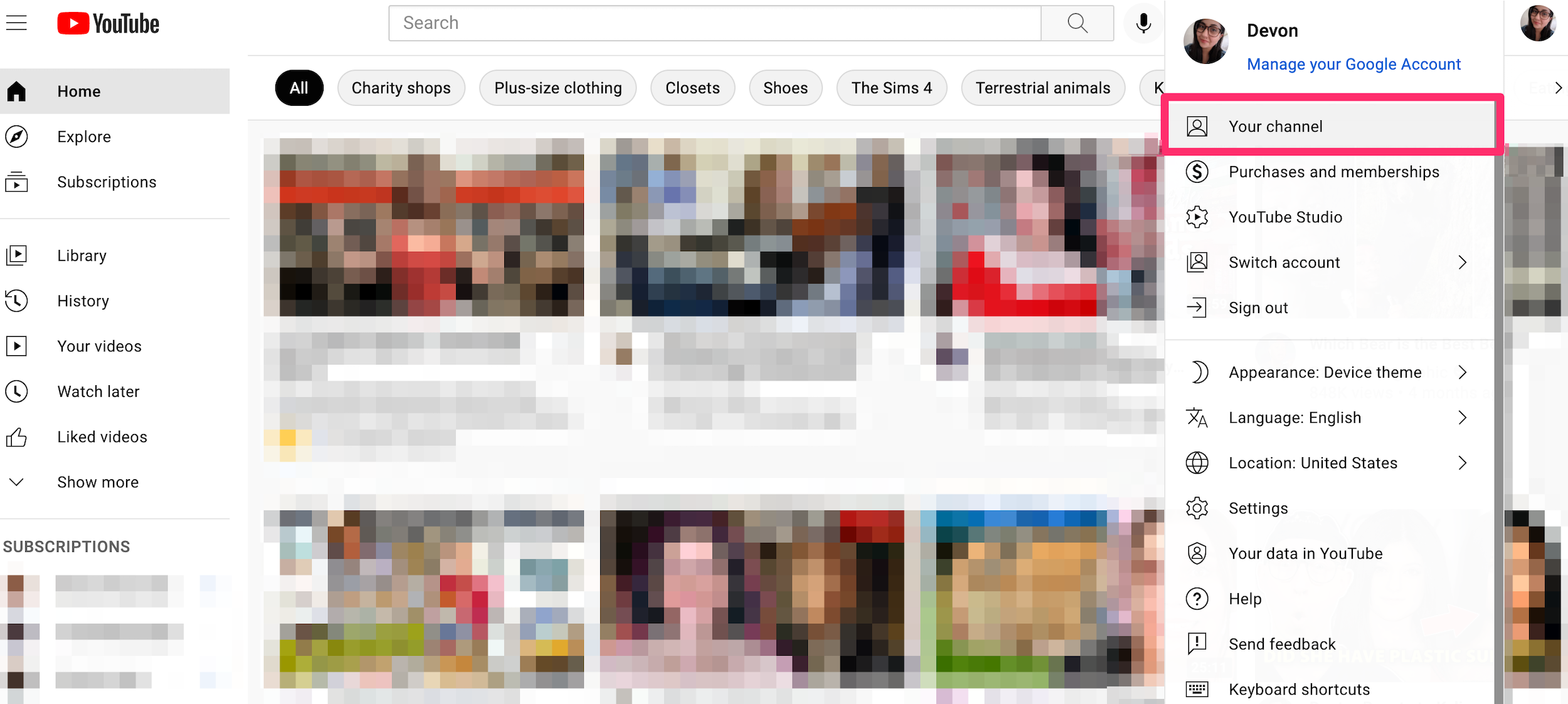 Screenshot of YouTube homepage, profile icon drop-down menu