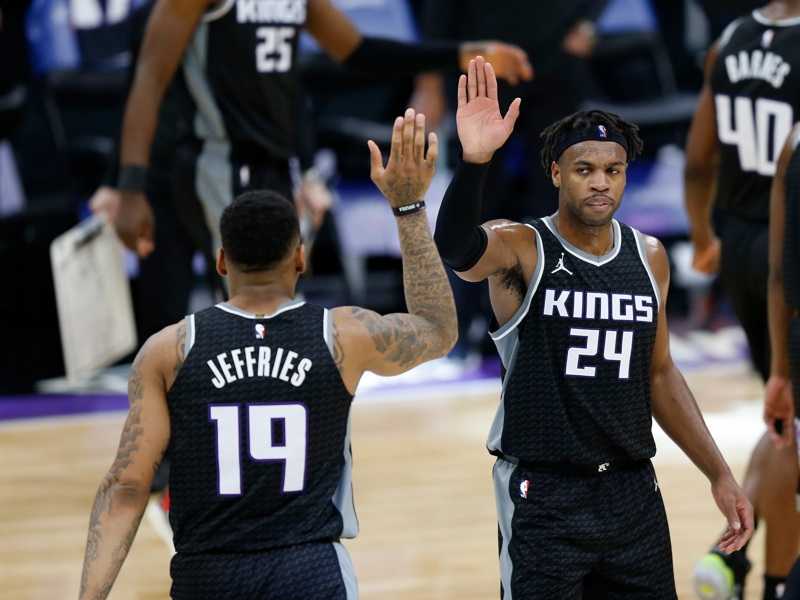 Buddy Hield and DaQuan Jeffries of the Sacramento Kings.