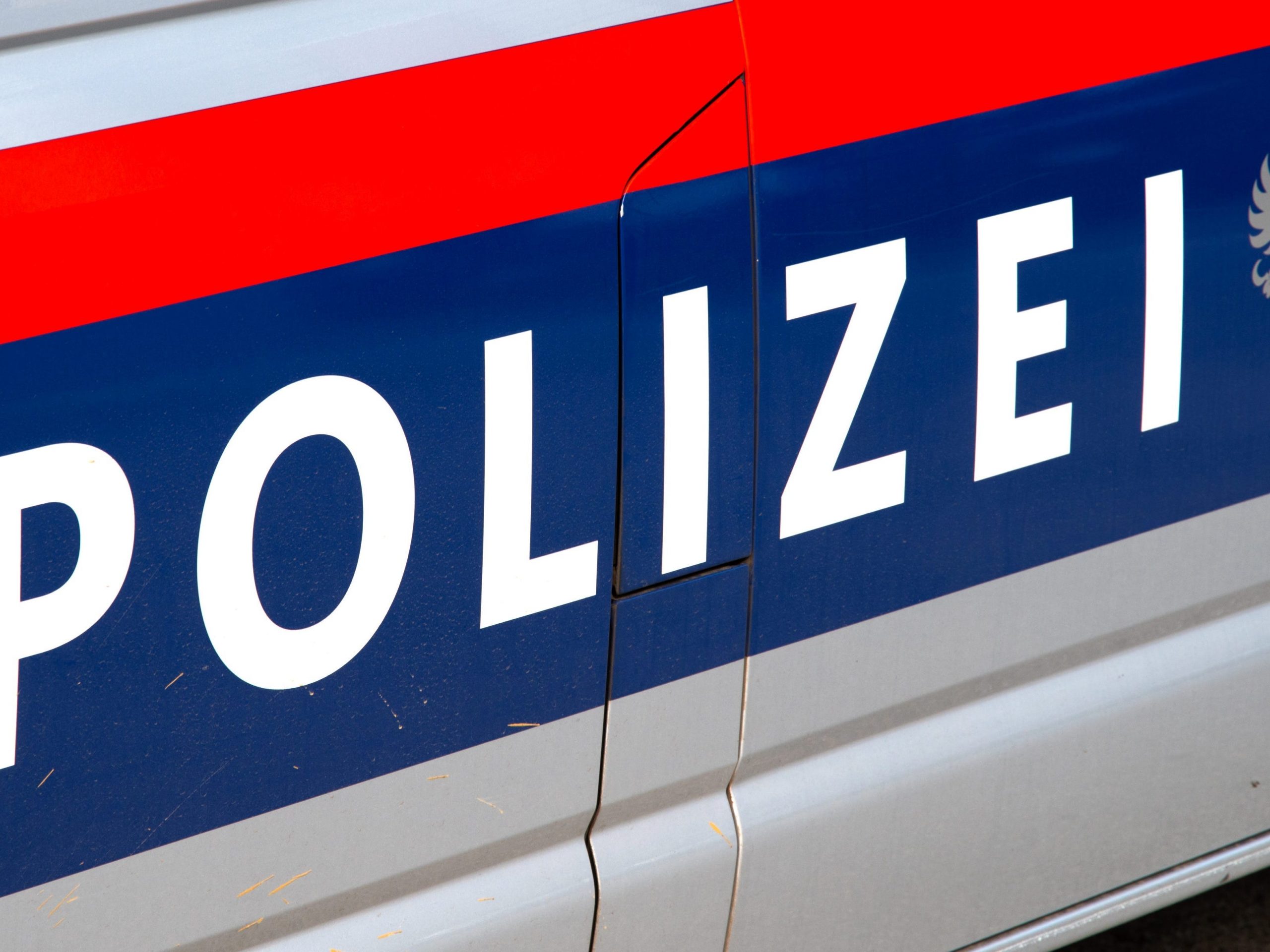 Car door lettering police Austria - stock photo