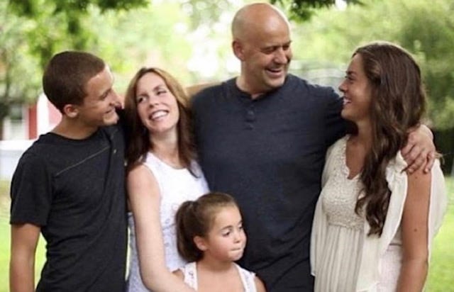 Kaley Young, her father Keith, sister Keira, mother Beth, and brother Christian stand outside for a family photo