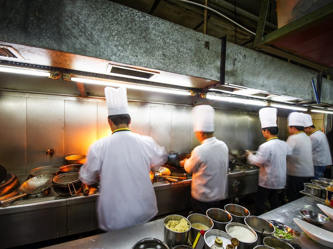 Chefs Working in Kitchen