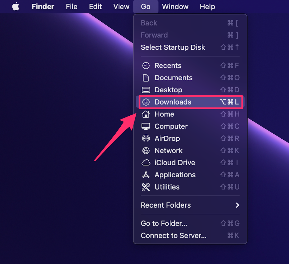 iMac screenshot of the Finder menu with the Downloads folder highlighted