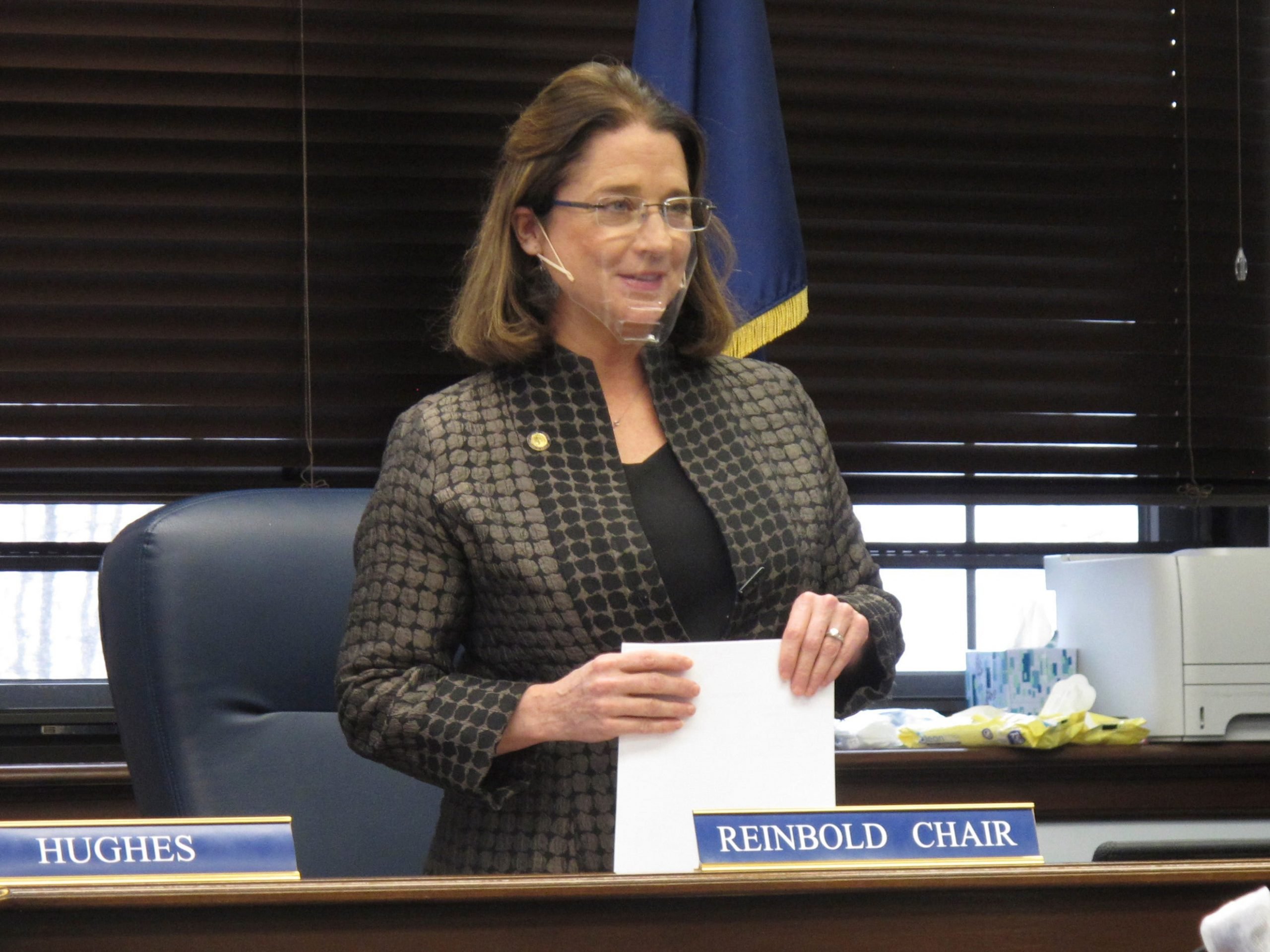 Alaska state Sen. Lora Reinbold stands in a hearing room before the start of a Senate Judiciary Committee meeting on Friday, March 12, 2021, in Juneau, Alaska.