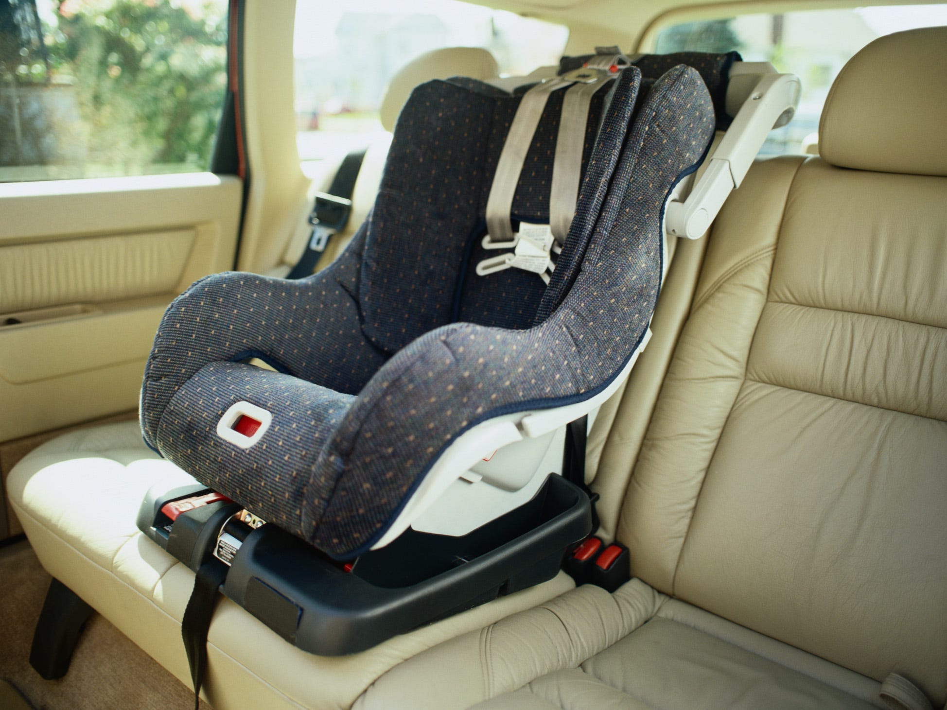 An empty car seat in a car.