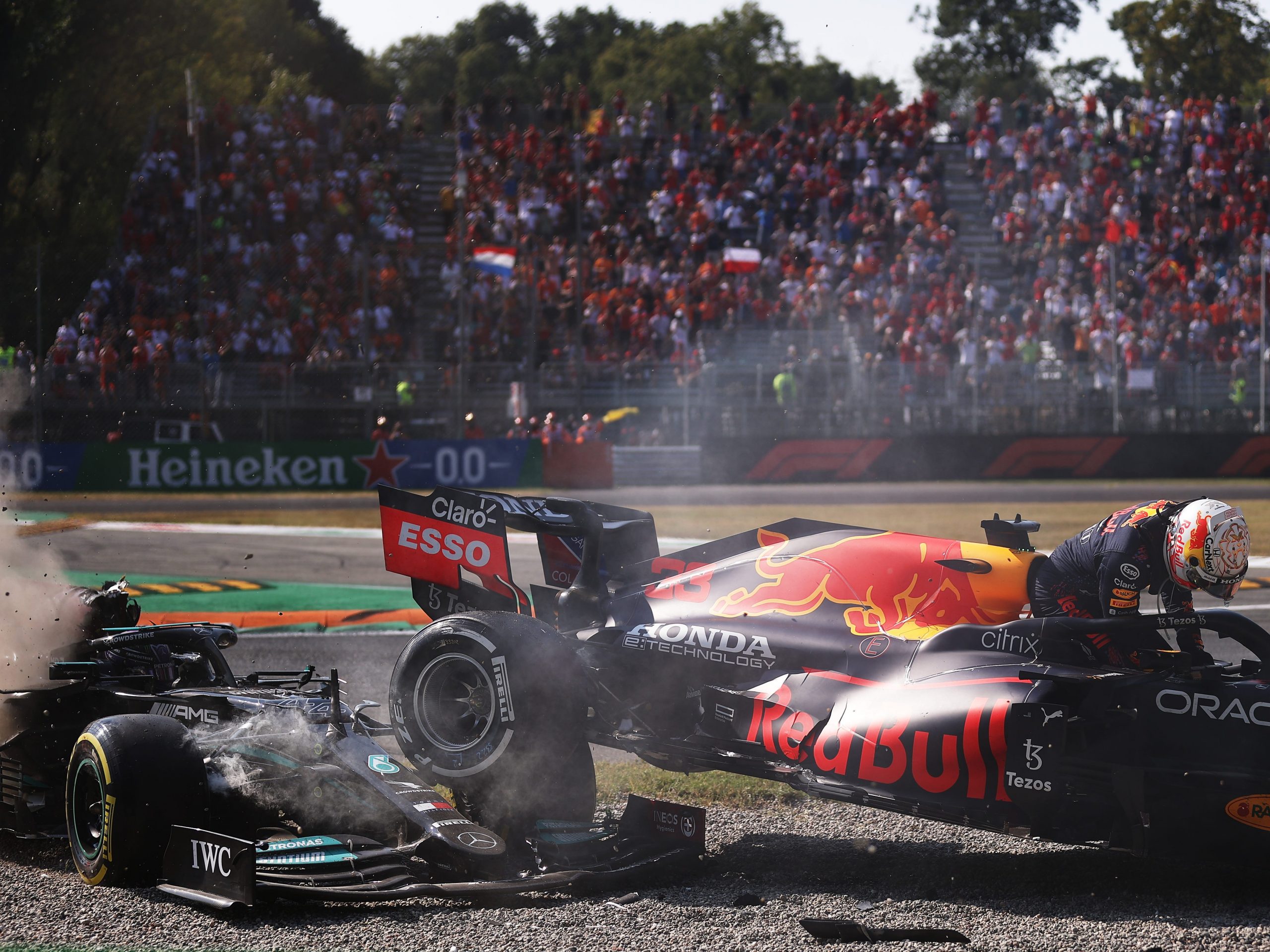 The cars of Max Verstappen and Lewis Hamilton beached after a crash