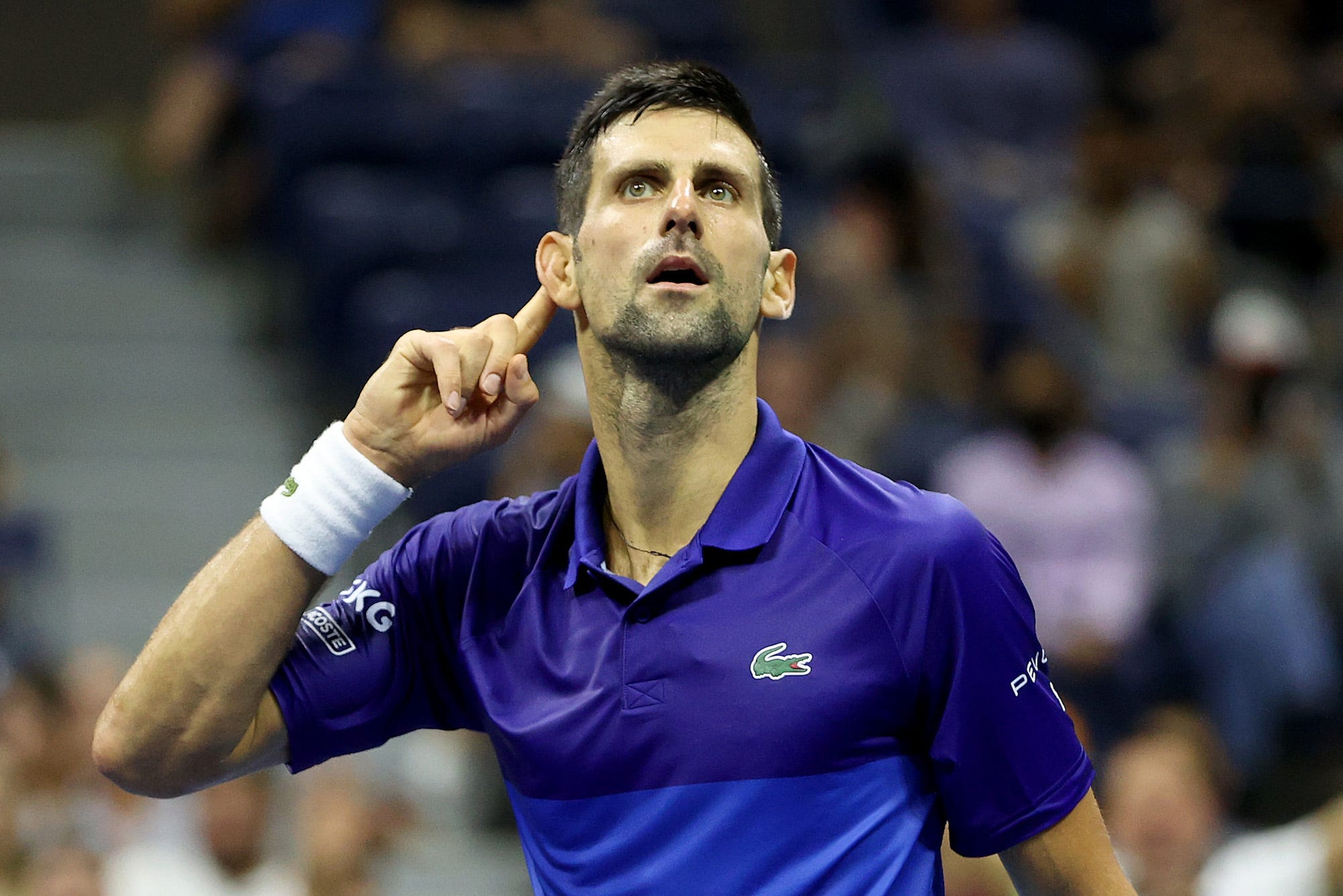 Novak Djokovic of Serbia reacts to the crowd as he plays against Matteo Berrettini of Italy during his Men's Singles quarterfinal match on Day Ten of the 2021 US Open at the USTA Billie Jean King National Tennis Center
