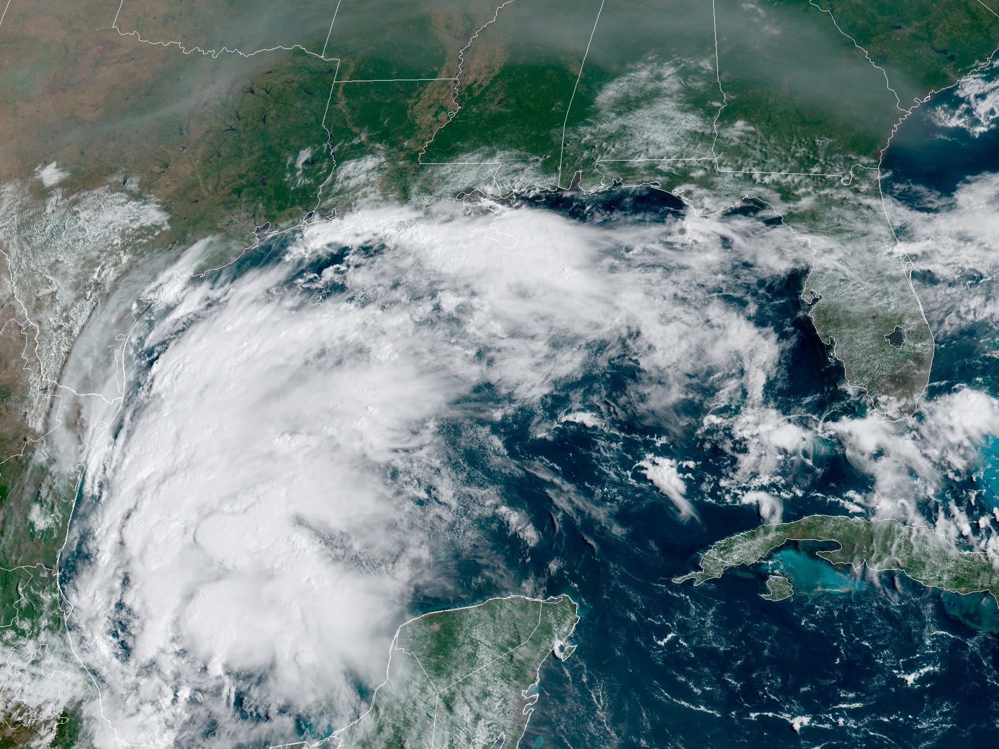 This satellite image provided by NOAA shows Tropical Storm Nicholas in the Gulf of Mexico on Sunday, Sept. 12, 2021.