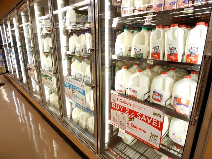 The milk section of a grocery store is pictured in Los Angeles April 7, 2011.    REUTERS/Mario Anzuoni 