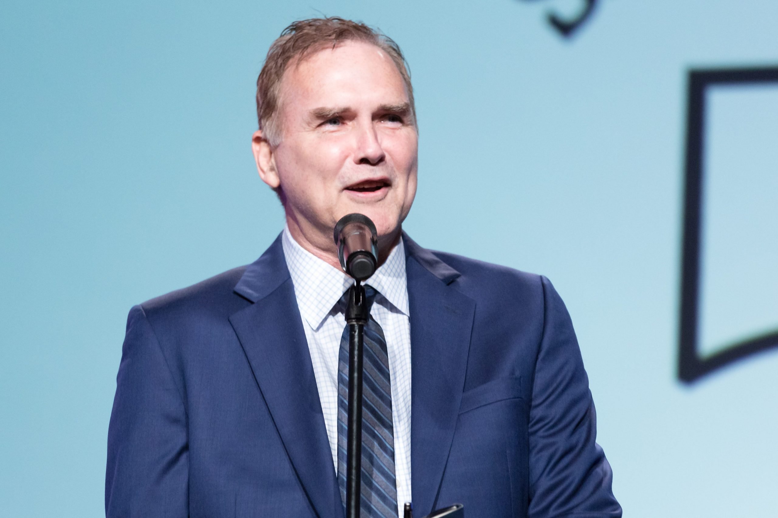 Comedian Norm MacDonald performs on stage at the Saban Community Clinic's 50th Anniversary Dinner Gala at The Beverly Hilton Hotel on November 13, 2017 in Beverly Hills, California.