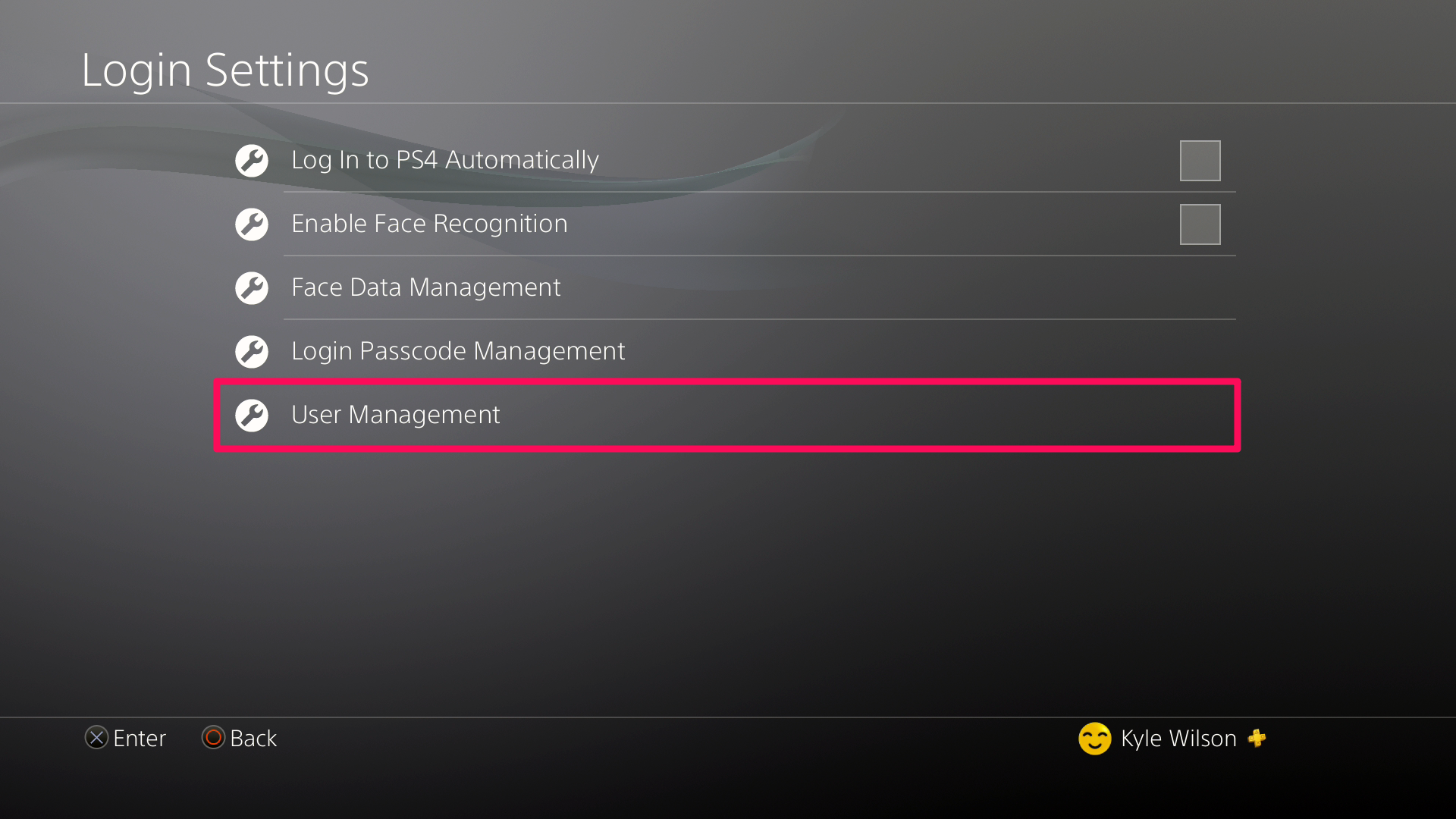 A screenshot of the PS4 Login Settings page with a box around the User Management option.
