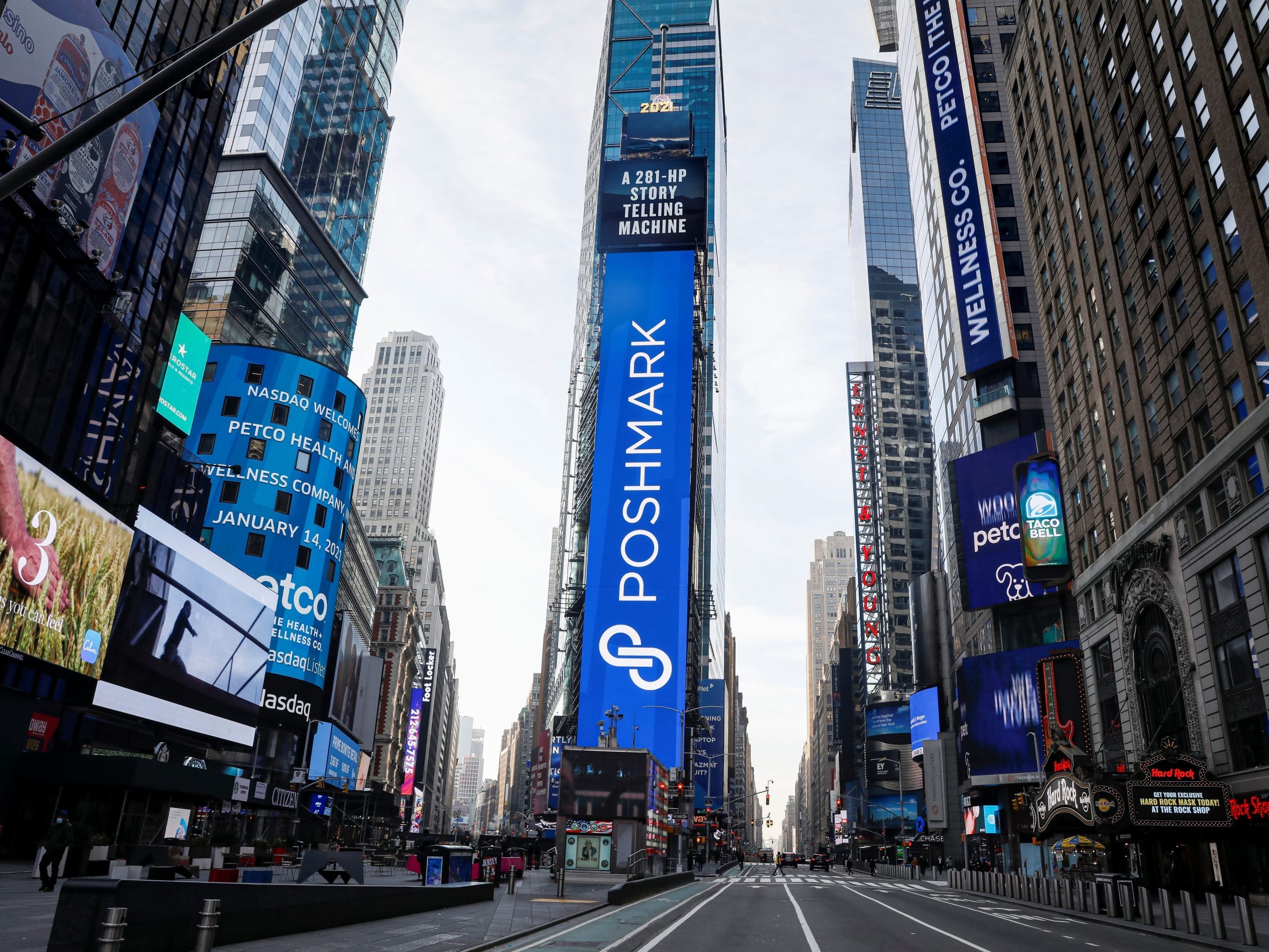 A large narrow video screen displays the announcement of Poshmark Inc.'s IPO at the Nasdaq Market Site in Times Square in New York