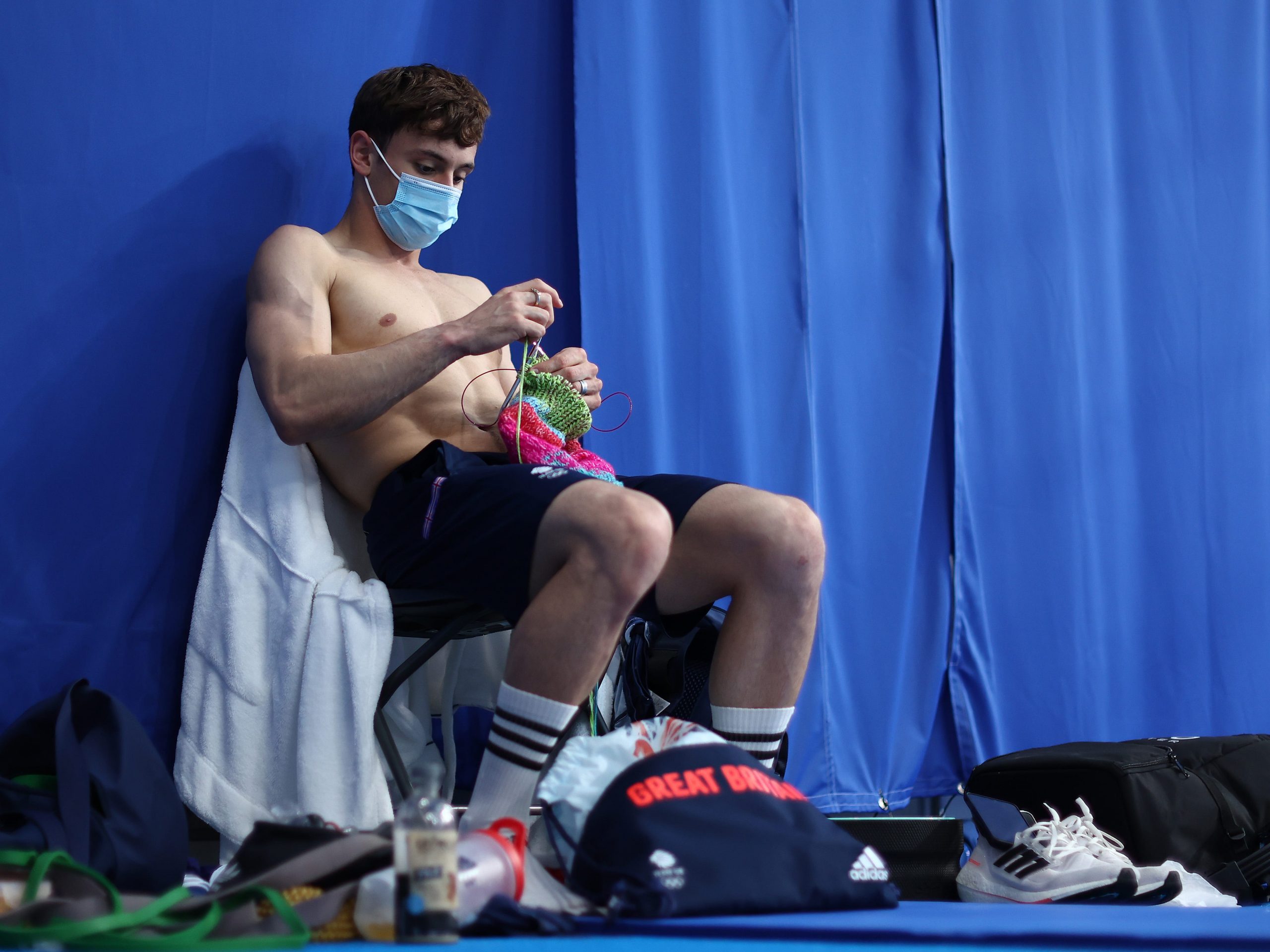 Thomas Daley of Team Great Britain is seen knitting before the Men's 10m Platform Final on day fifteen of the Tokyo 2020 Olympic Games at Tokyo Aquatics Centre on August 07, 2021 in Tokyo, Japan.