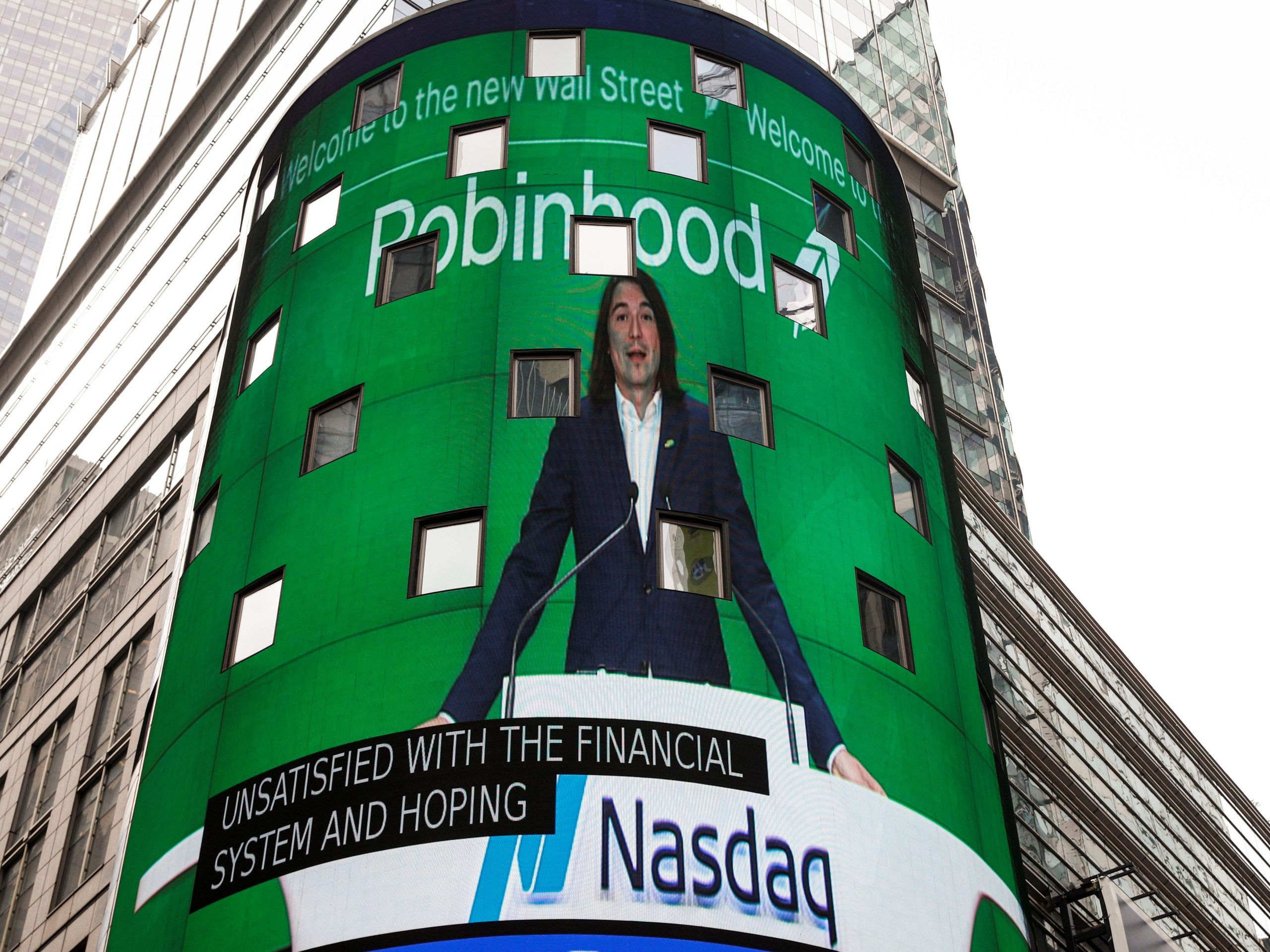 Robinhood Vlad standing at Nasdaq time square billboard