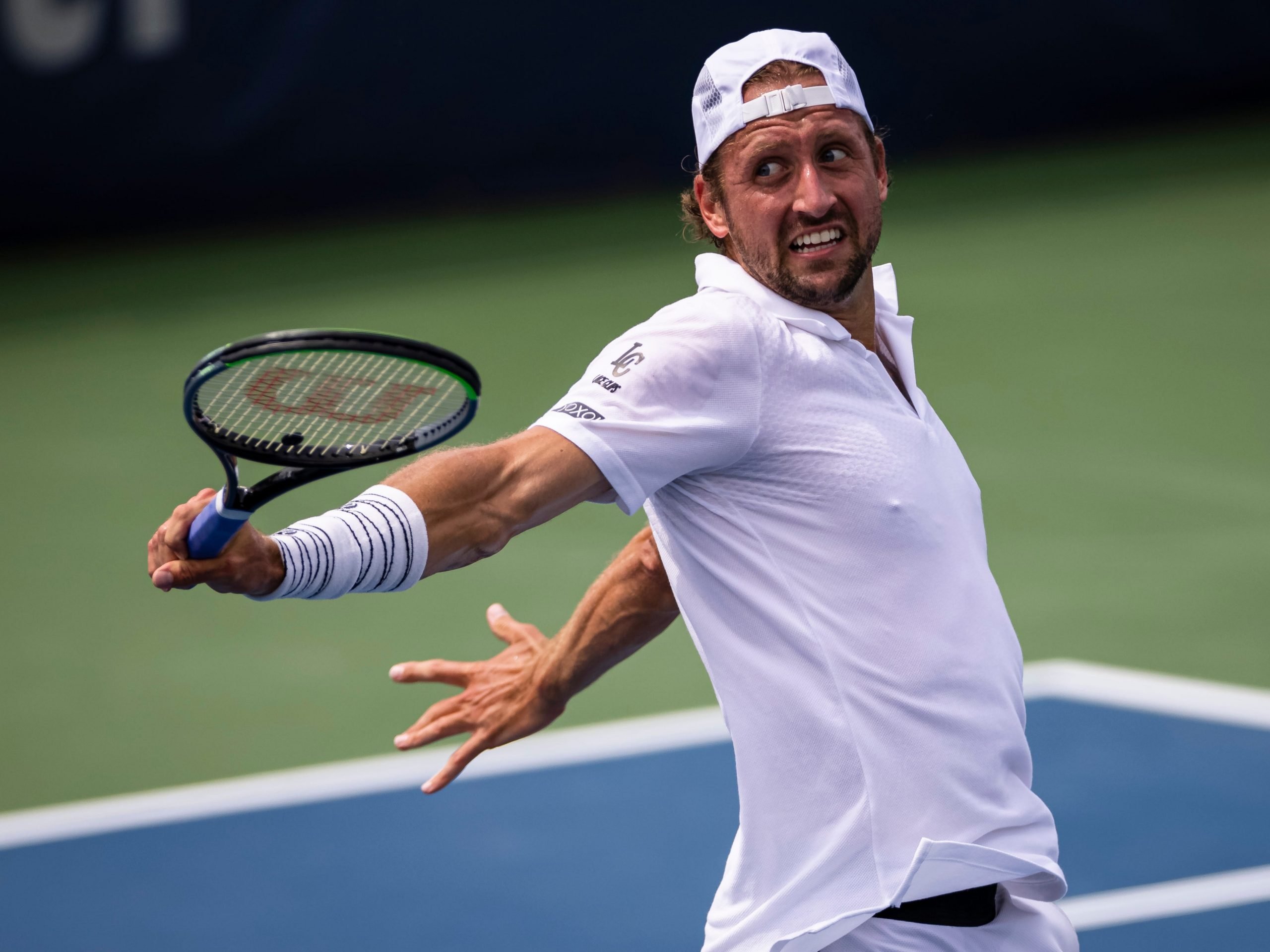 Tennys Sandgren swings for the ball