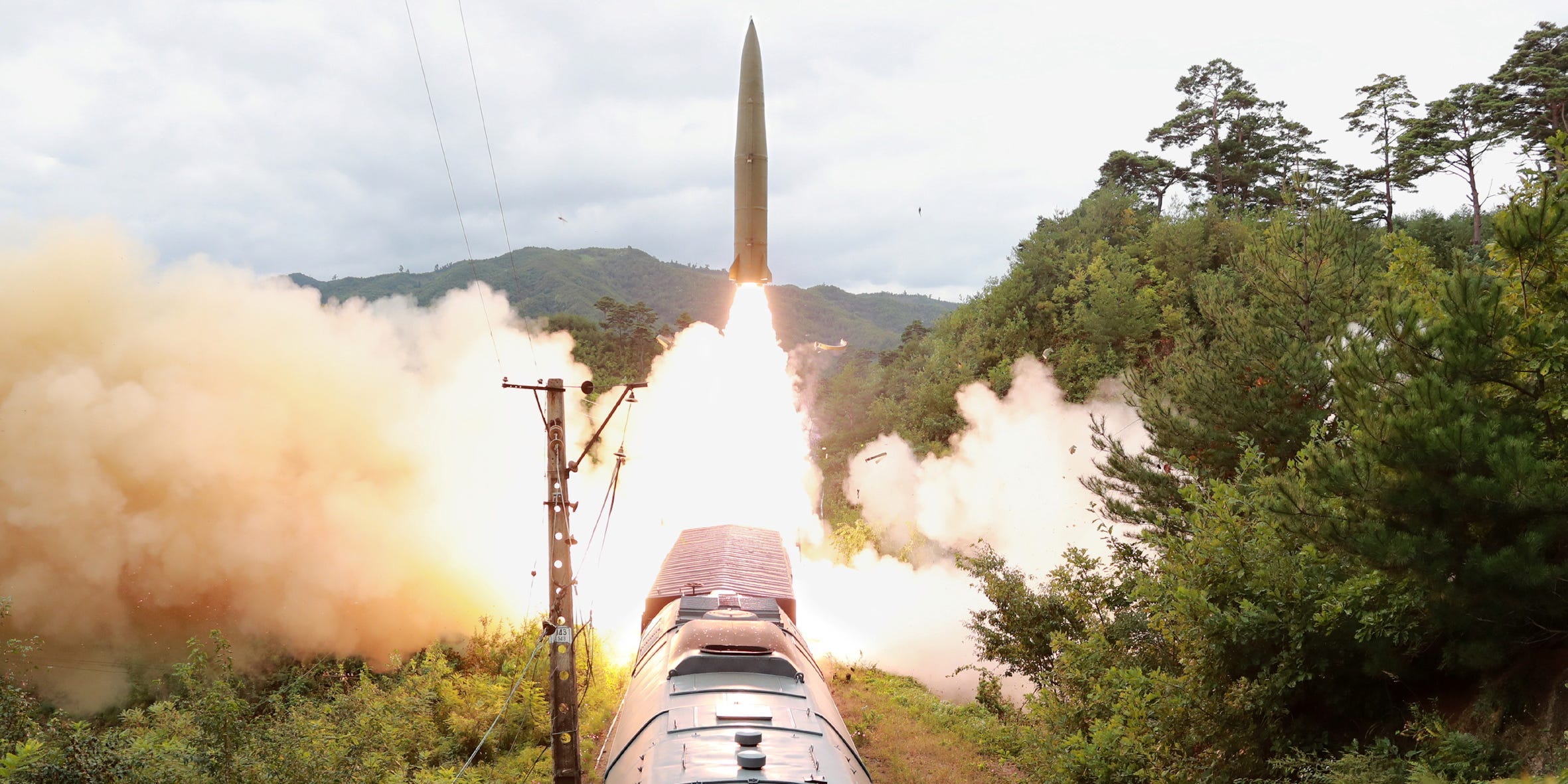 A missile is seen launched during a drill of the Railway Mobile Missile Regiment in North Korea