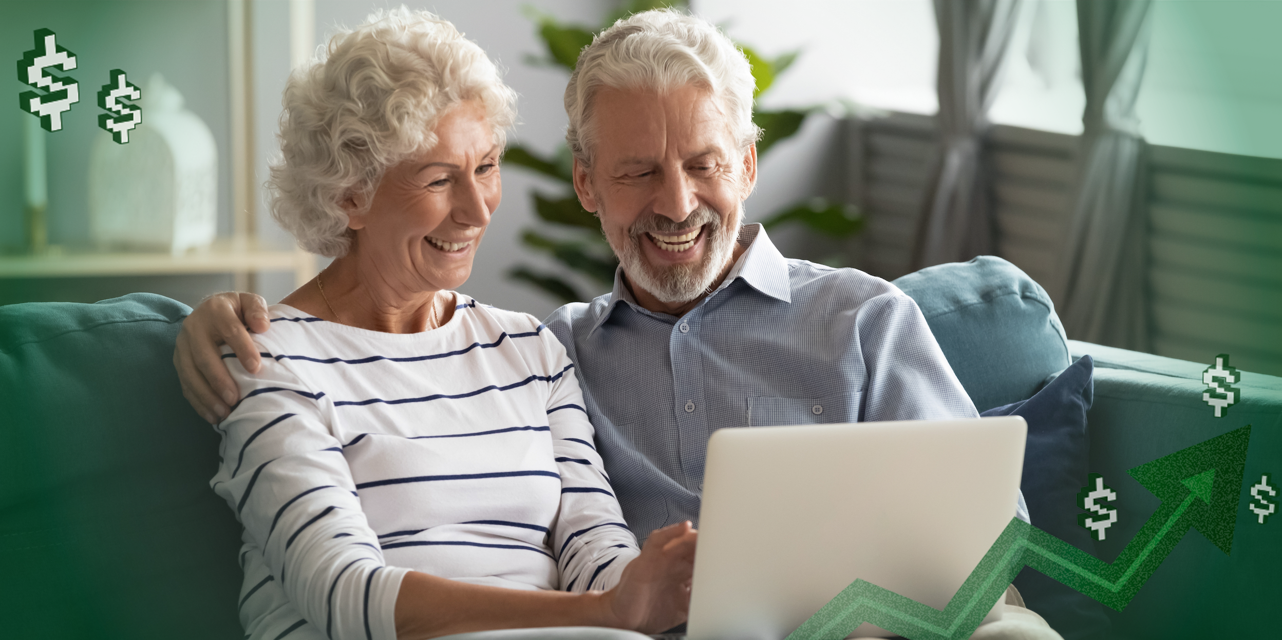 Middle-age couple sitting on the couch using a computer together.