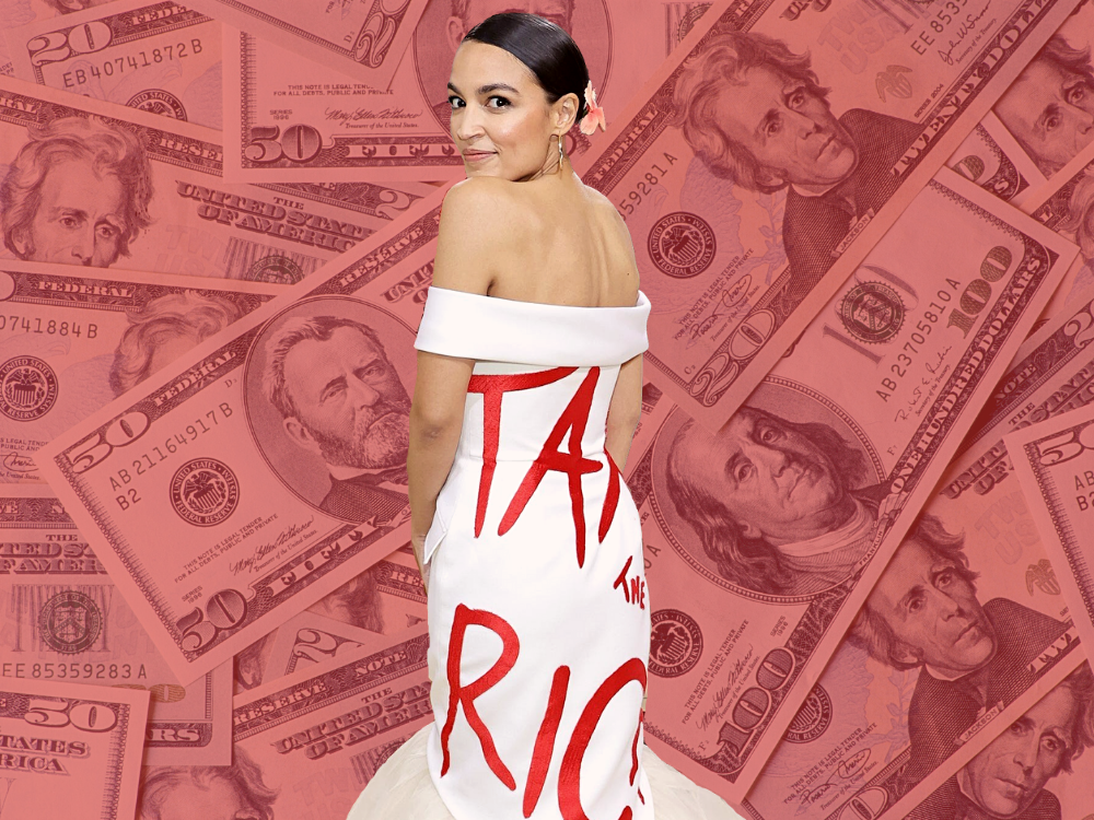 Rep. Alexandria Ocasio-Cortez wearing her Met Gala "Tax the Rich" dress in front of a backdrop with dollar bills.