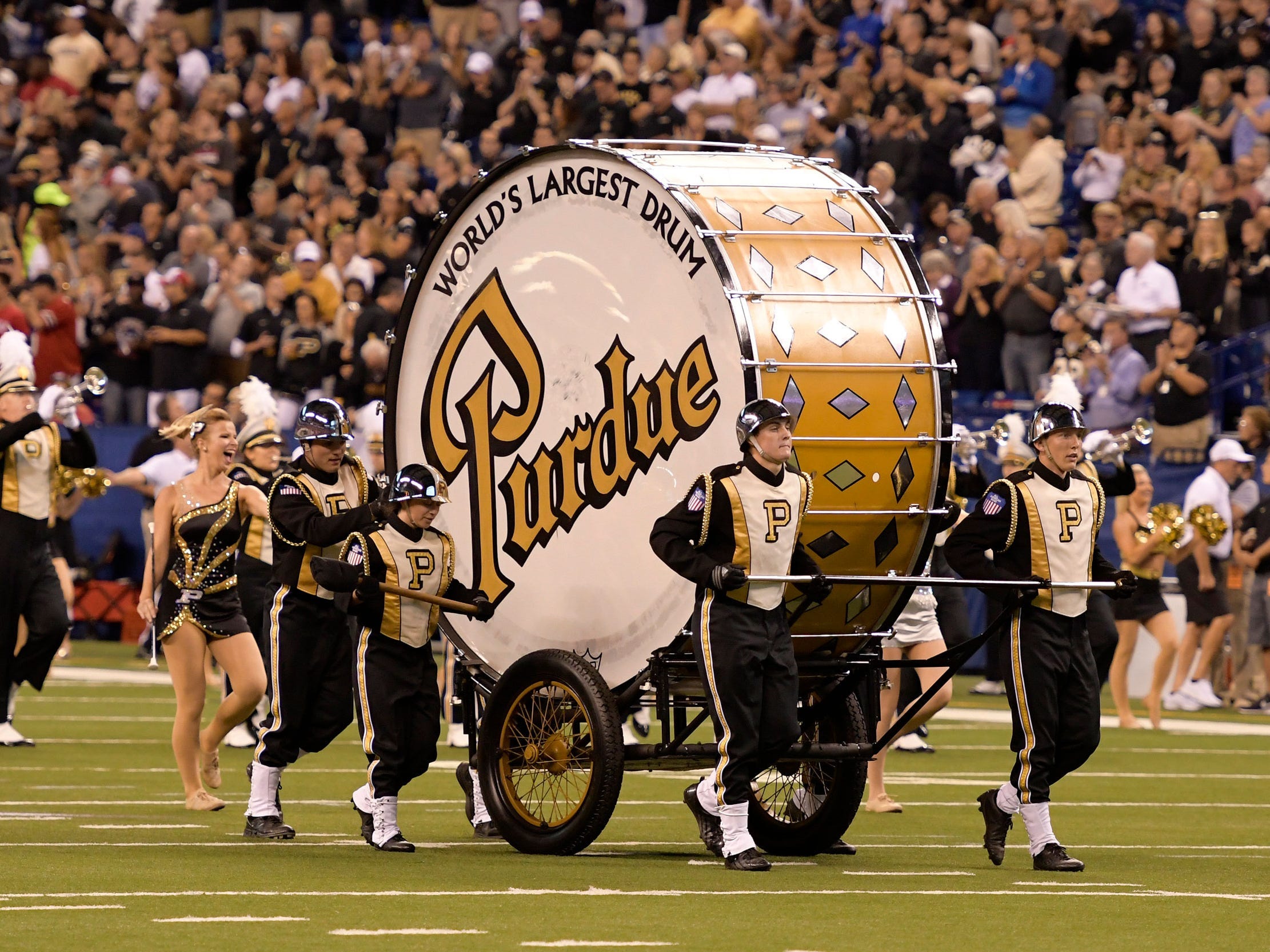 Purdue marching band takes the field with the "World's Largest Drum" in 2017.