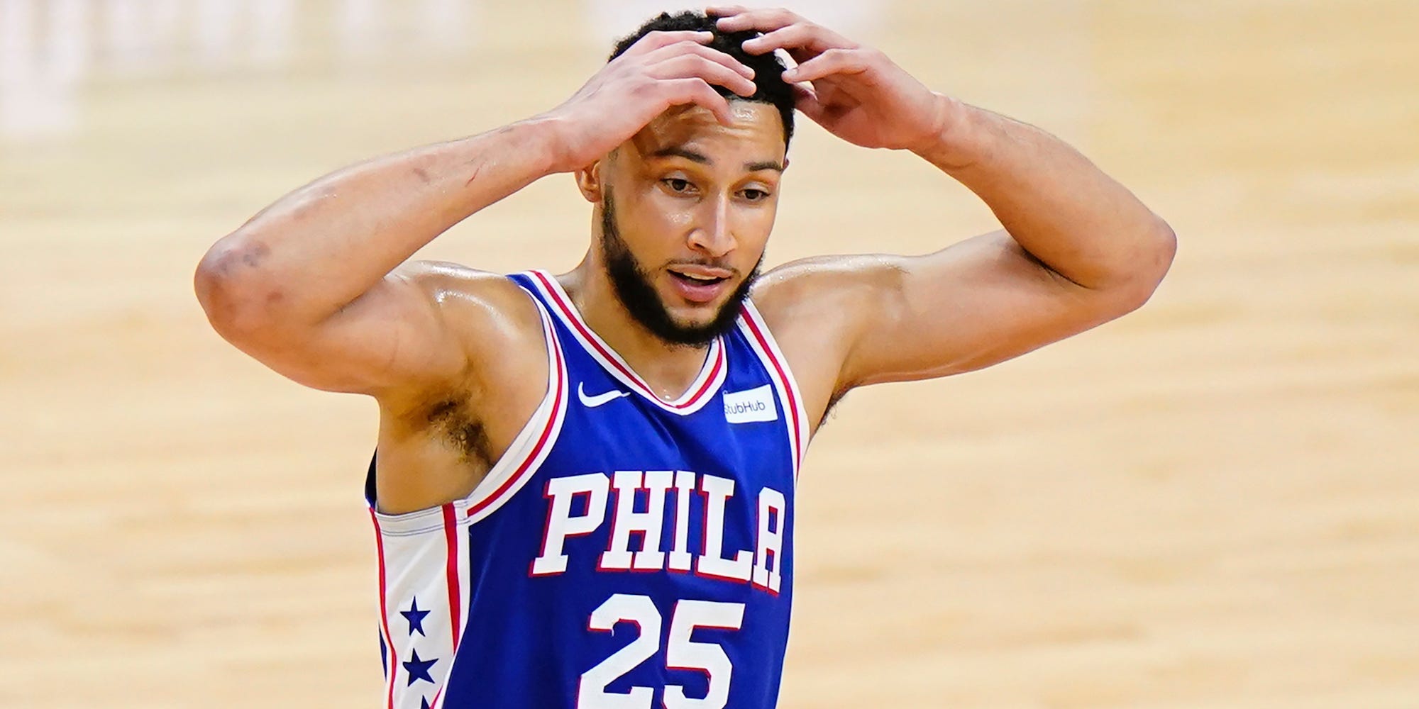 Ben Simmons put his hands on his head during a game in 2021.