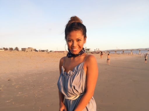 Actress Jessica Joan poses on a beach.