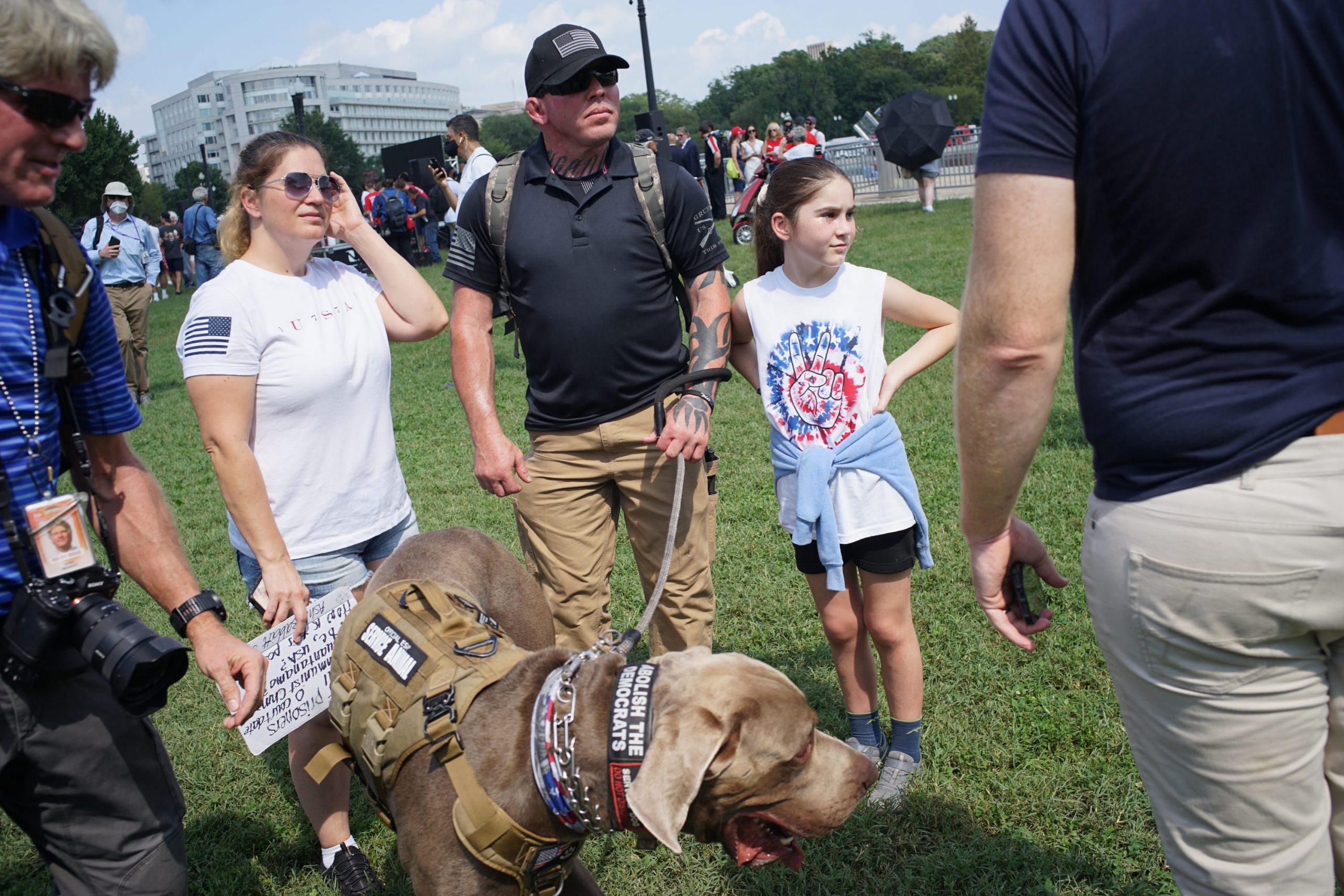 A man with a large dog.